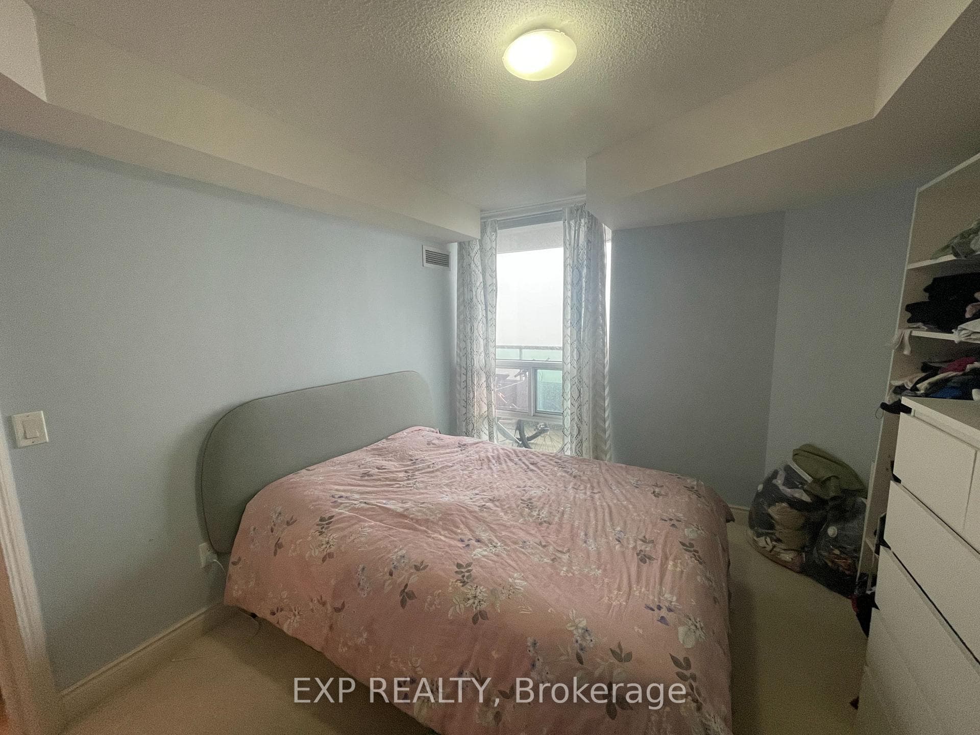 Primary bedroom with South views and double closet