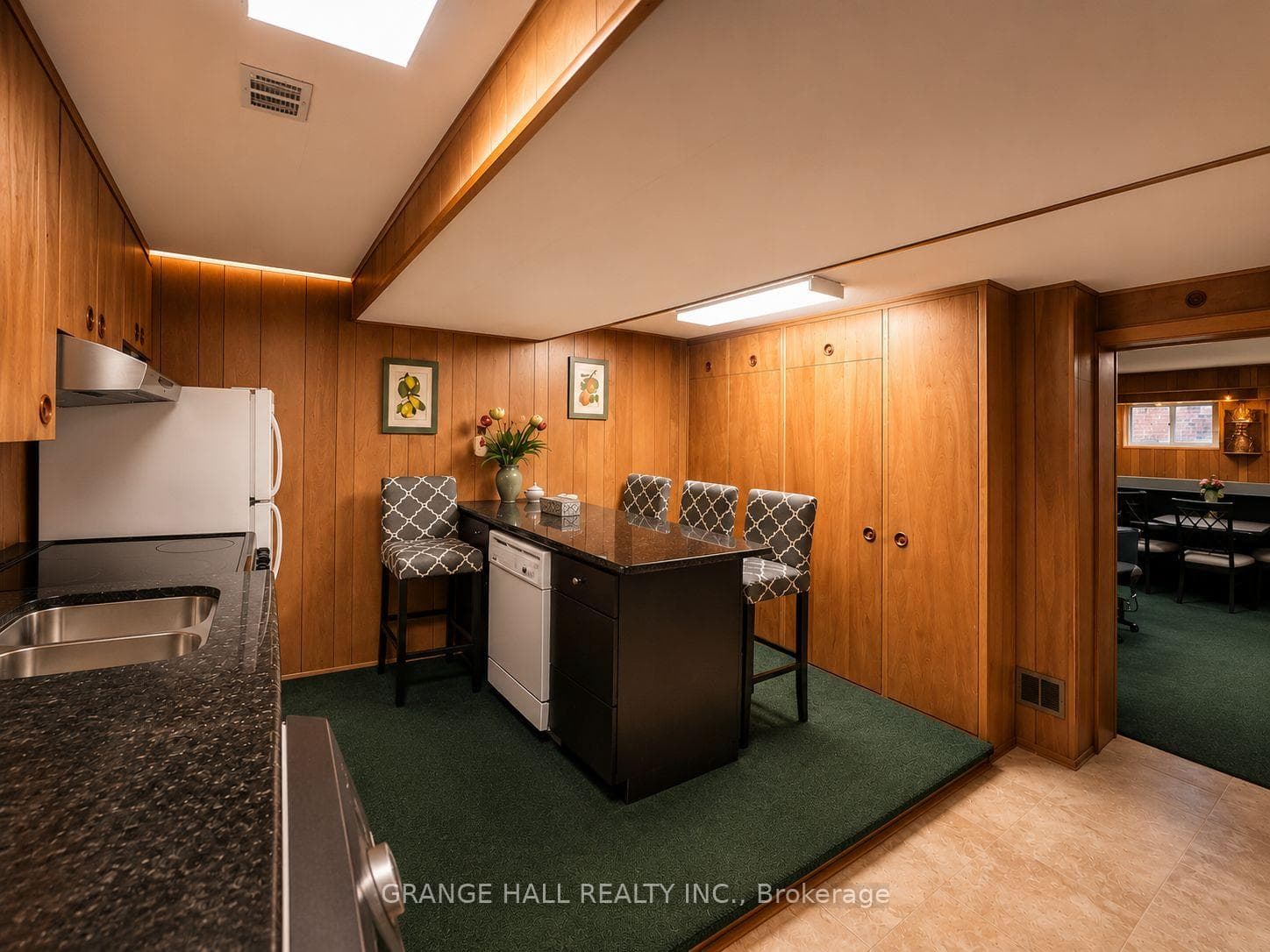 Eat-in kitchen and laundry in the basement