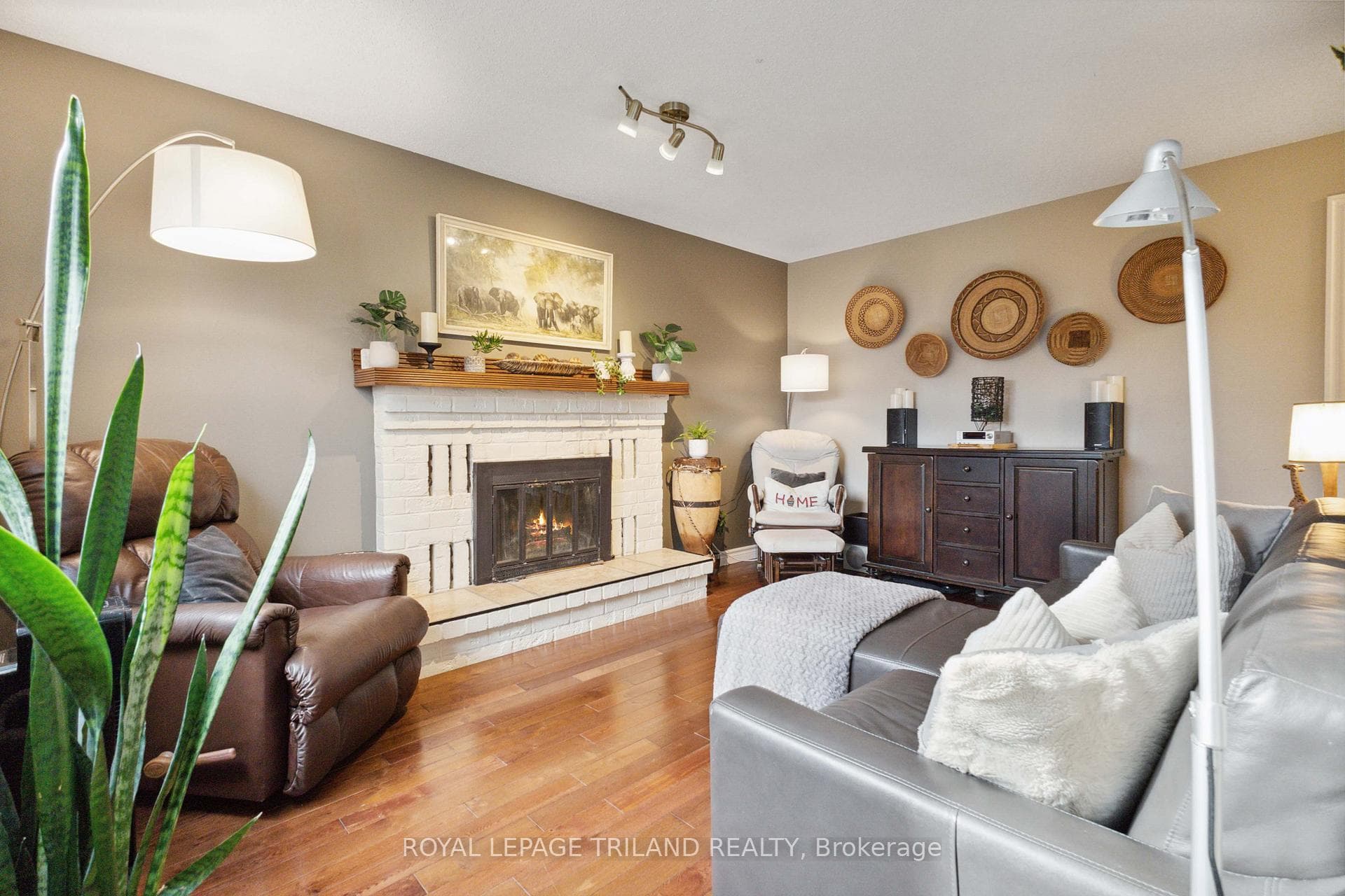 Family room off kitchen w/ wood burning fireplace