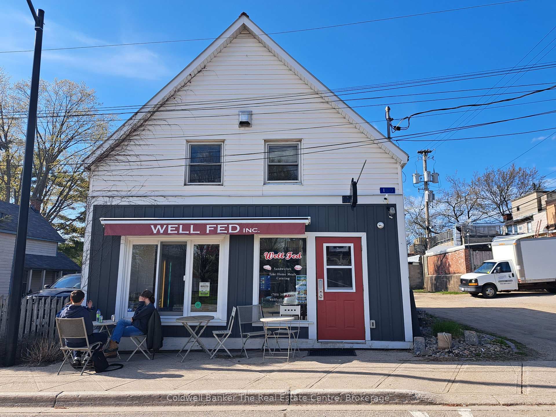 Front Road Side with Well Fed Deli Tenant