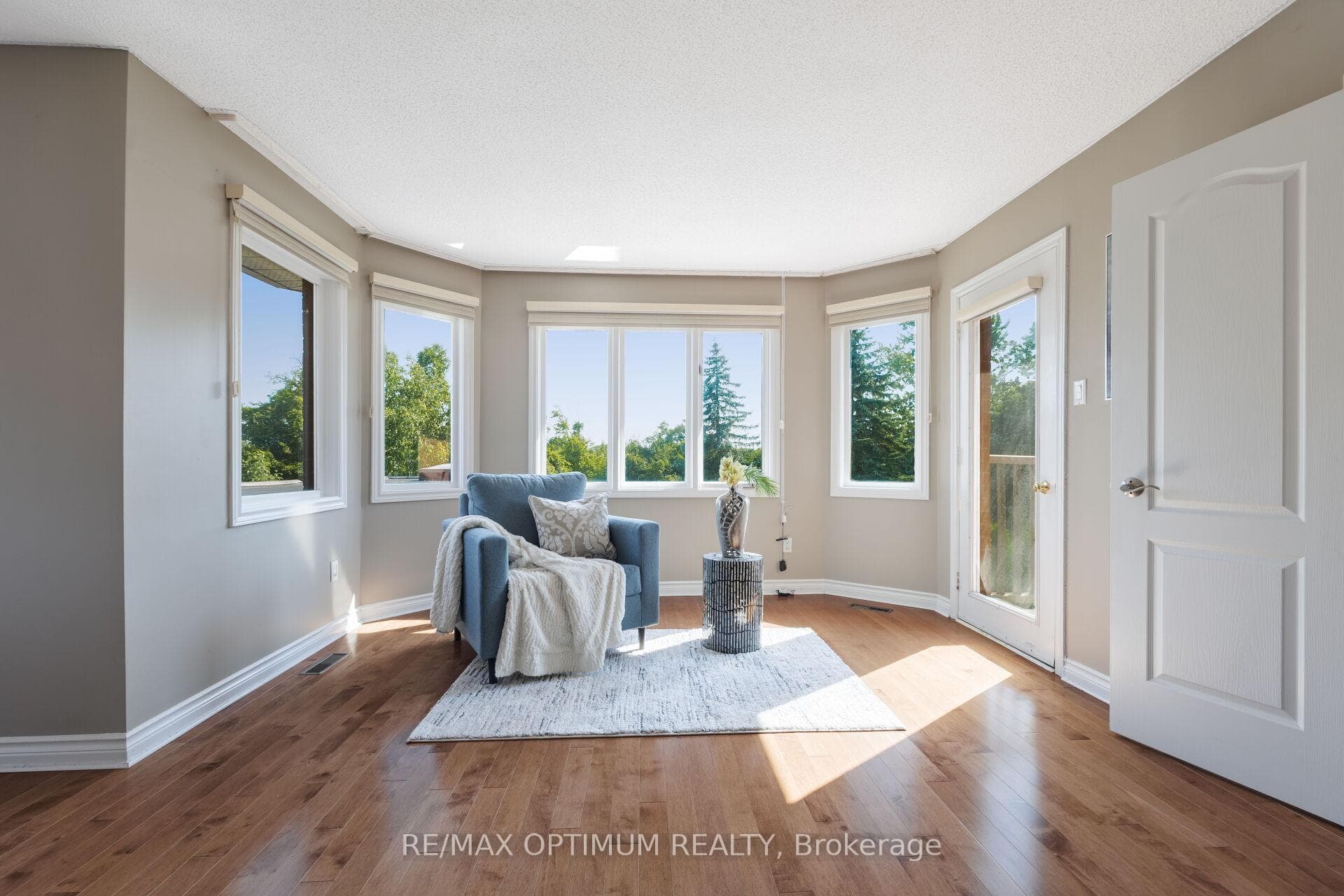 Sun-drenched primary with private balcony