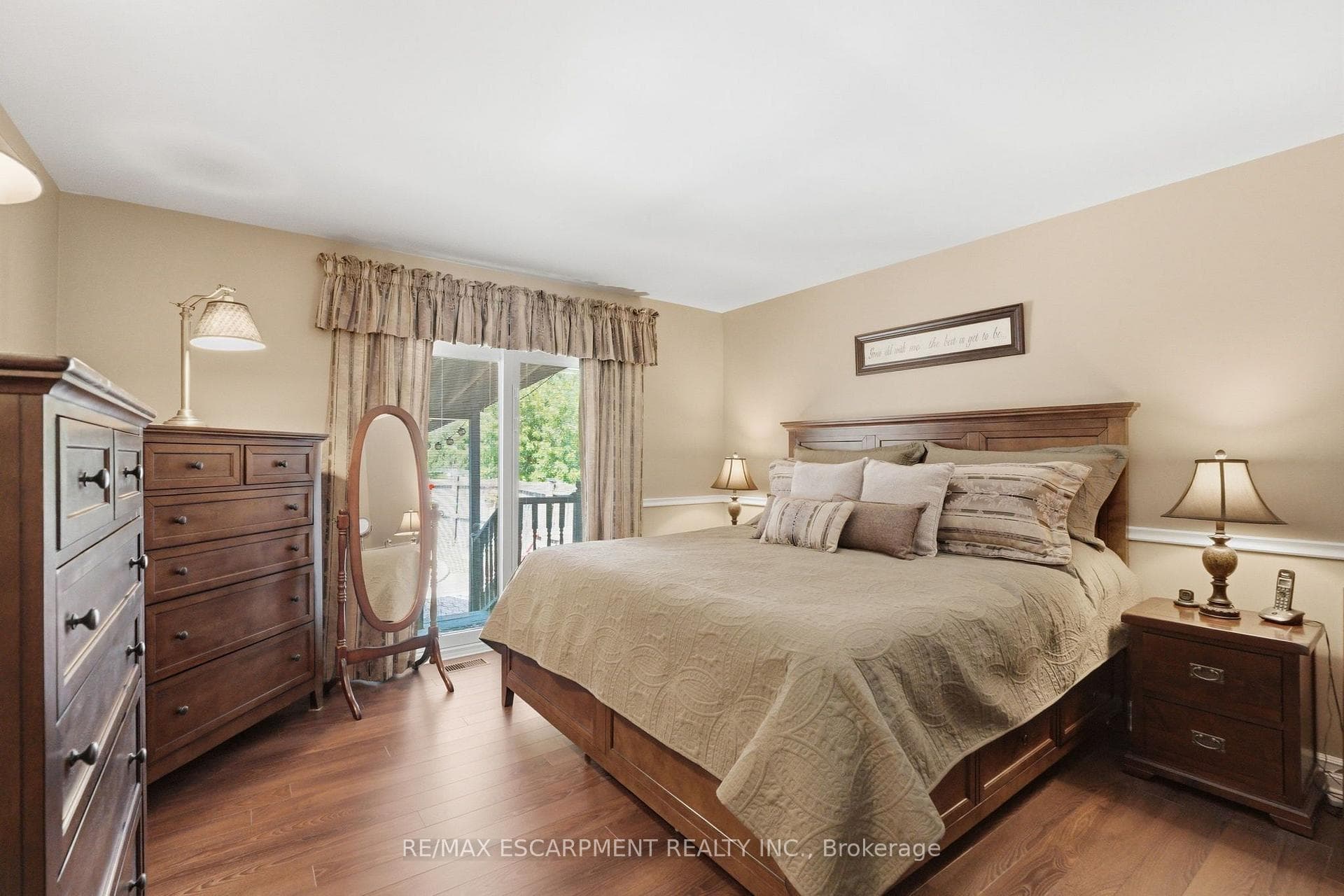Primary Bedroom w/sliding glass dr to pool & patio