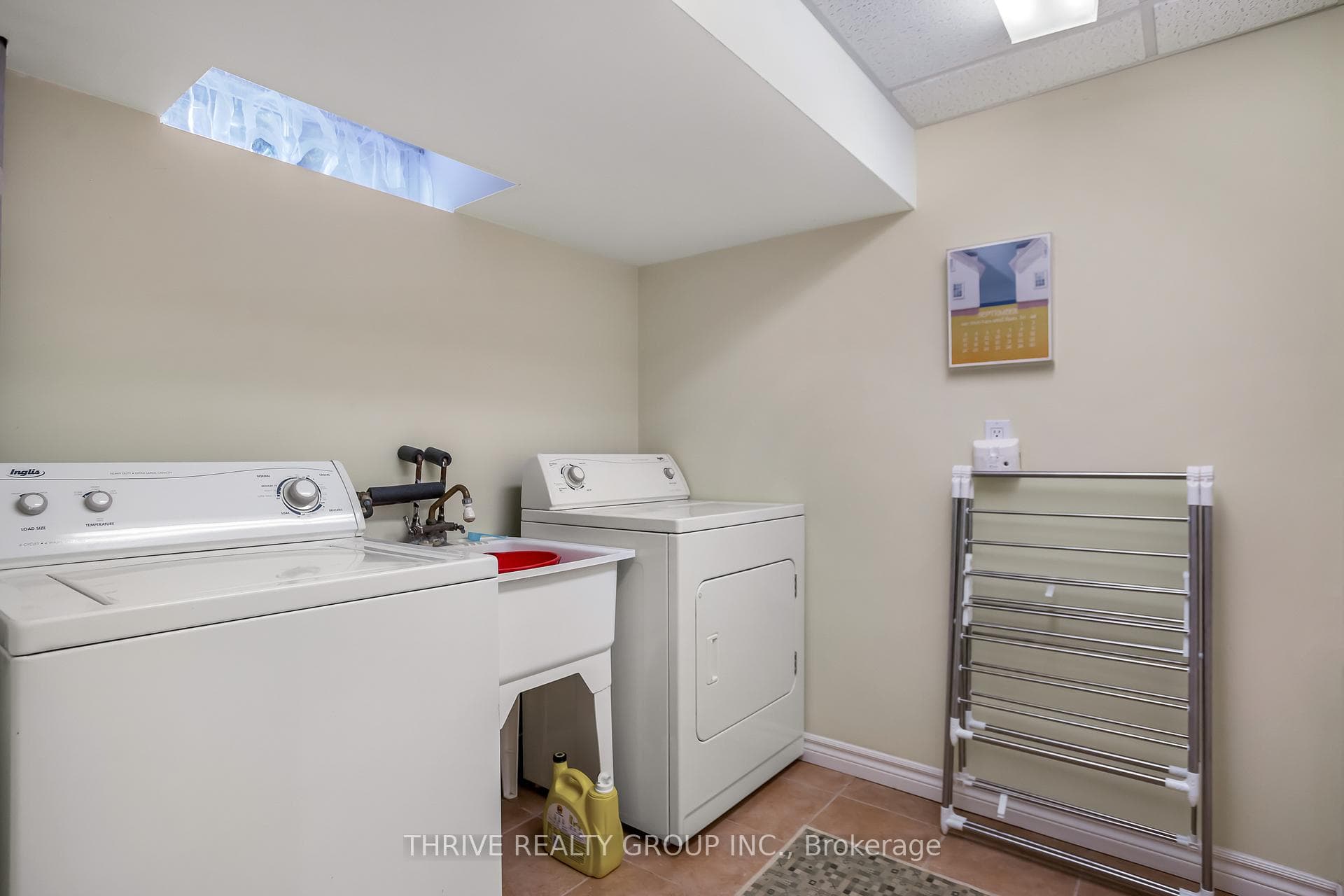 3rd level laundry room with double closet