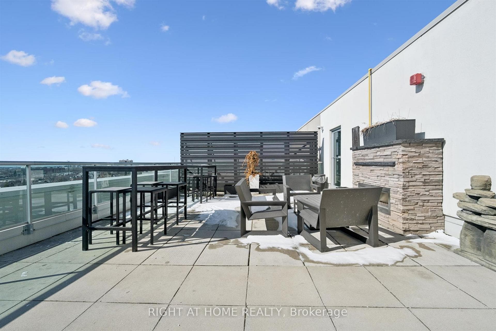 Another rooftop garden with fireplace