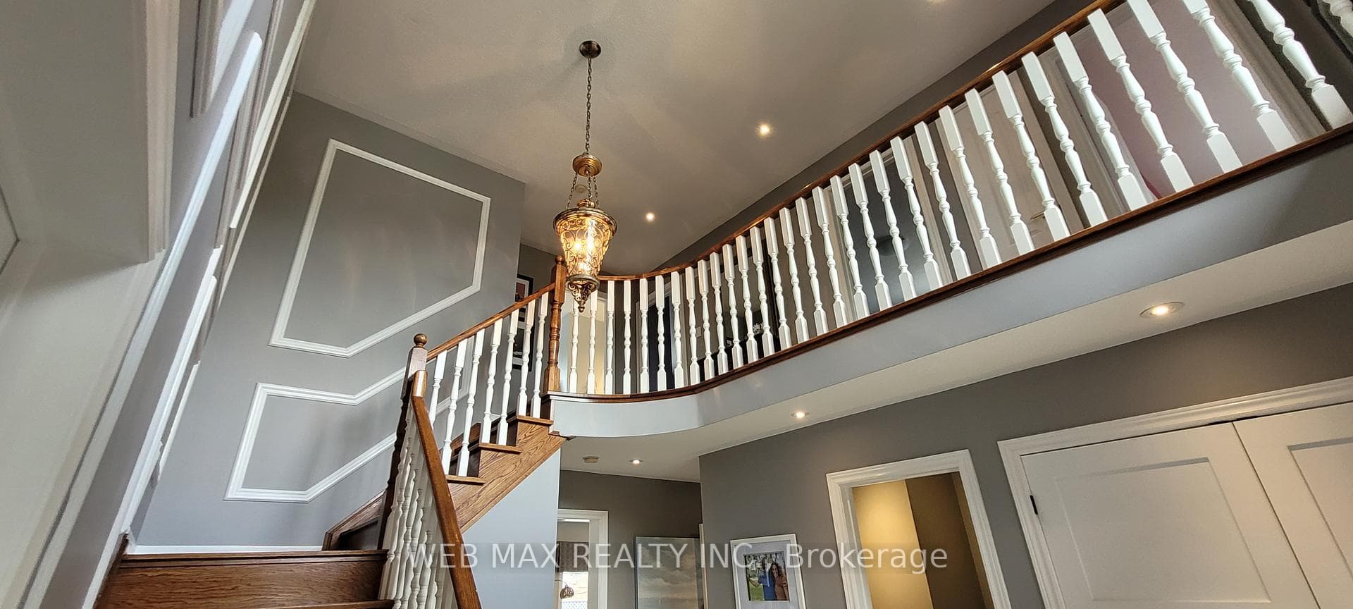 includes light fixture in grand 17 foot foyer,