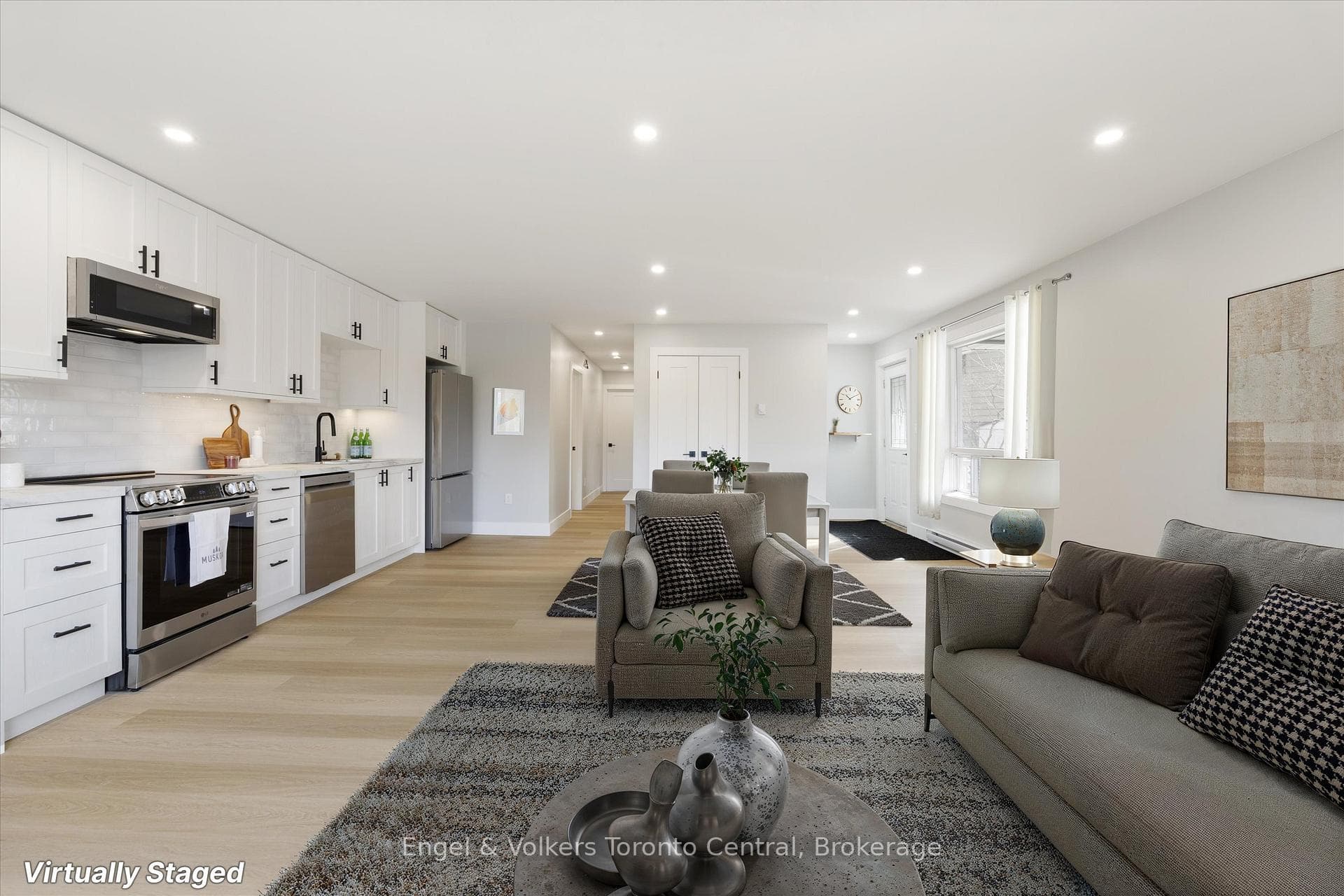 Living room and kitchen (virtually staged)