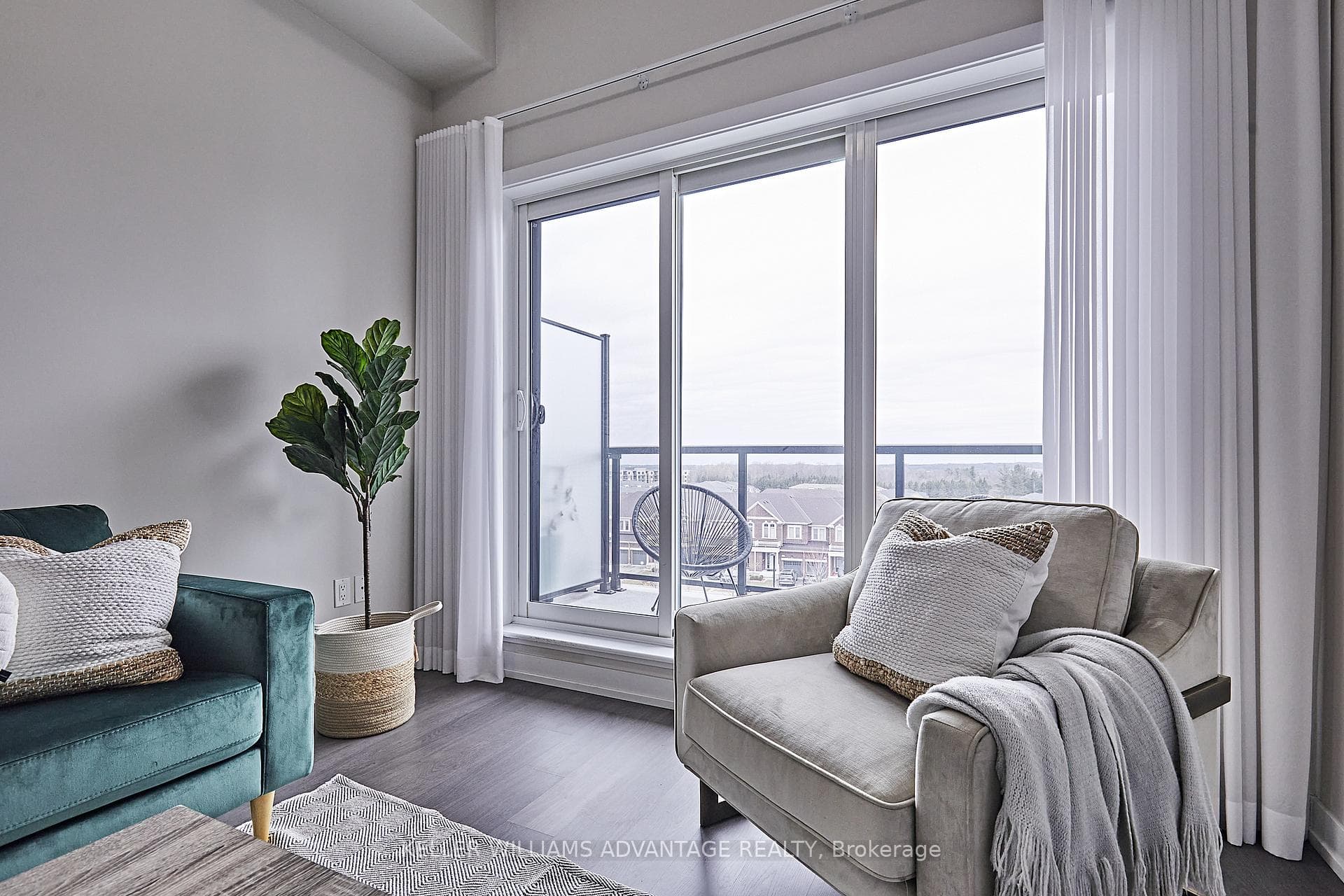 Living room with walk-out to balcony