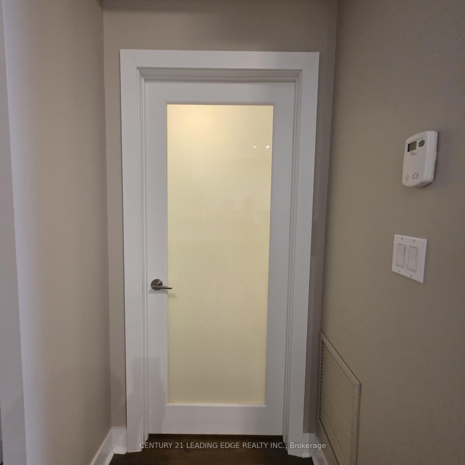 Den with upgraded glass door