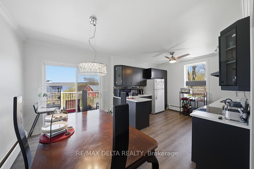 2-bed apt: patio doors to balcony.