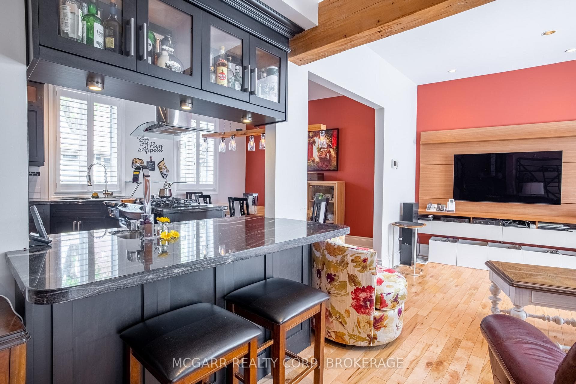 Bar overlooking kitchen, dining & living spaces