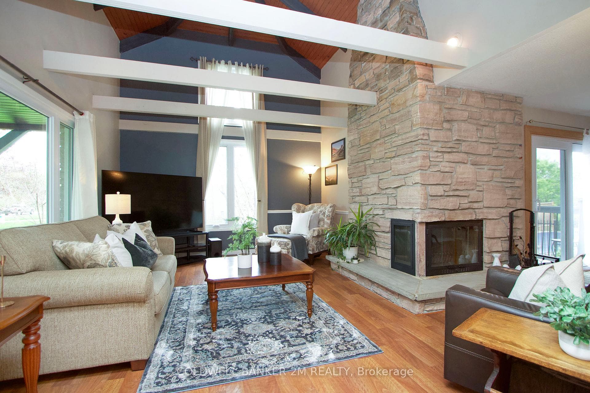 Living Room w/ Cathedral Ceilings
