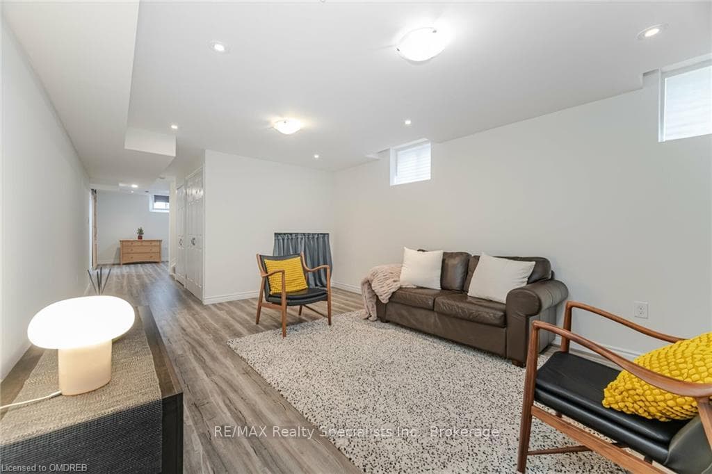 Living room with hardwood / wood-style floors