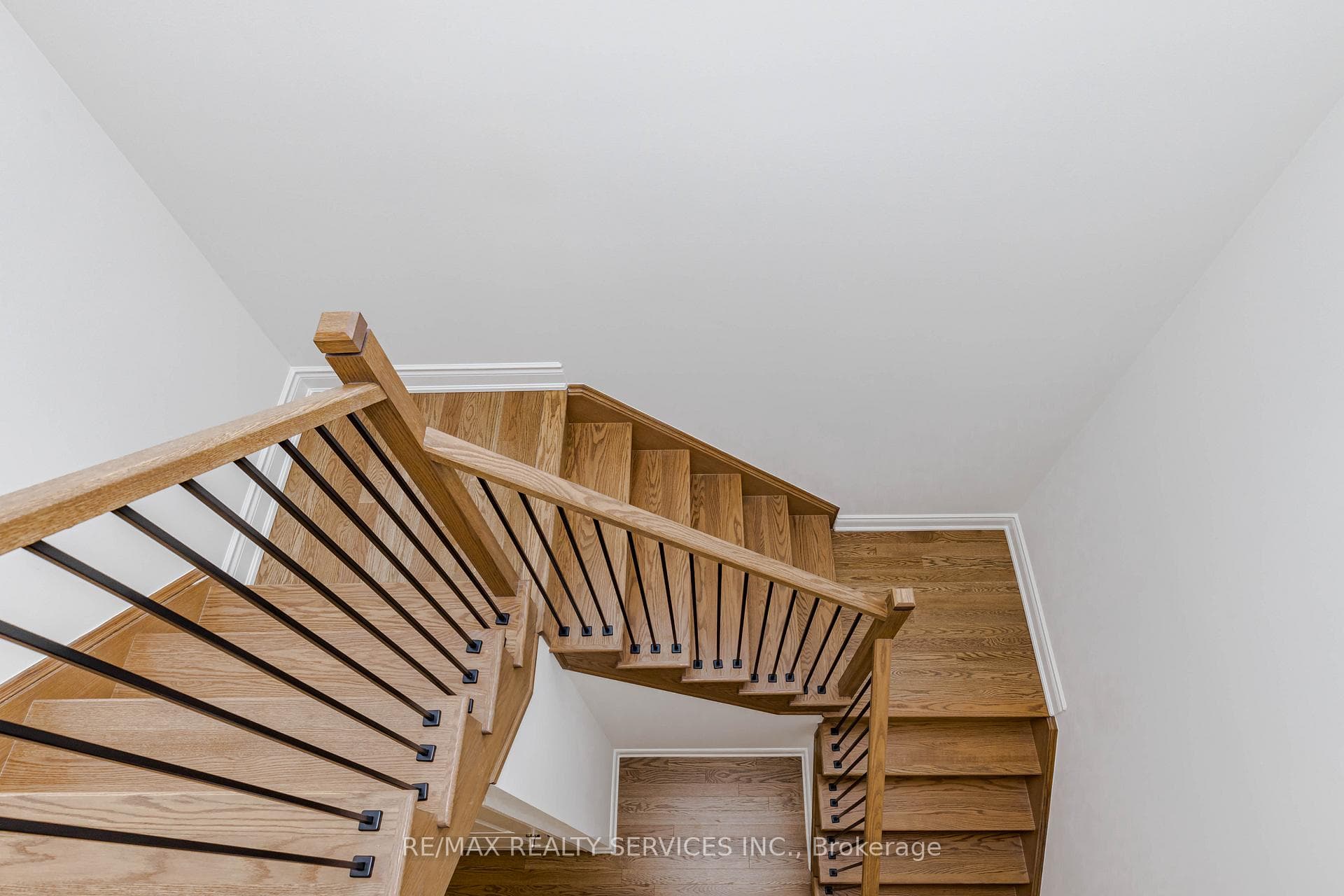 Oak Stairs with Iron Pickets