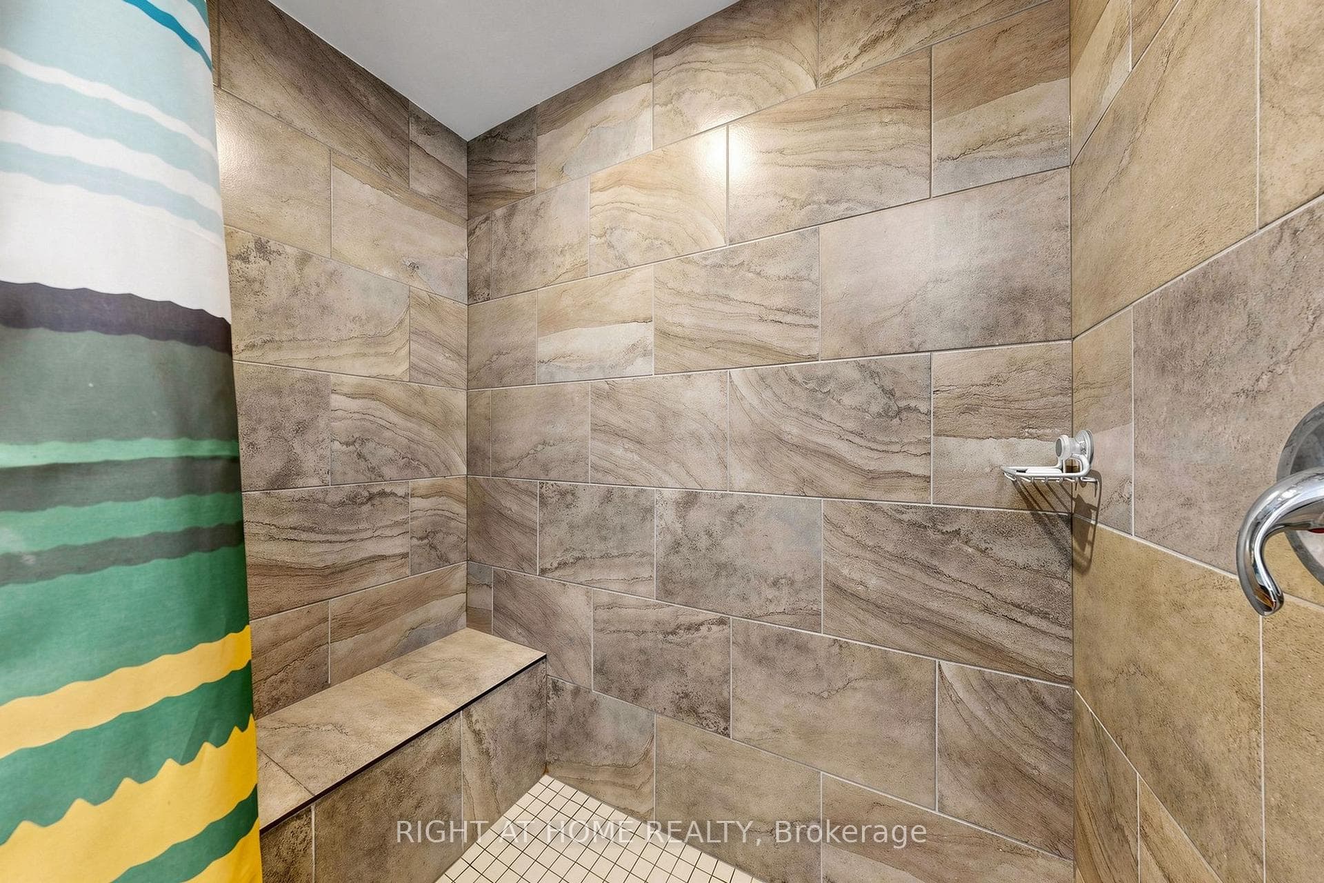 LOWER LEVEL SHOWER WITH SEAT