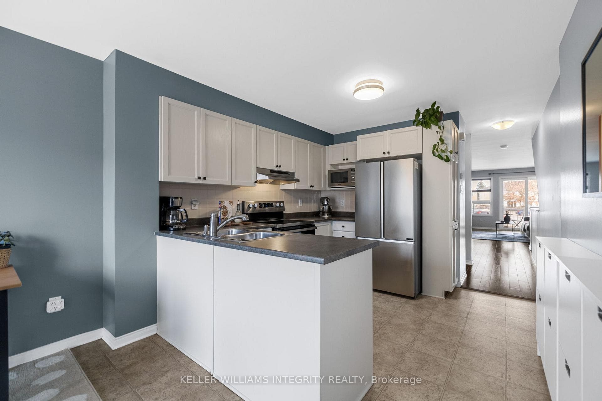 Bright kitchen with updated SS appliances