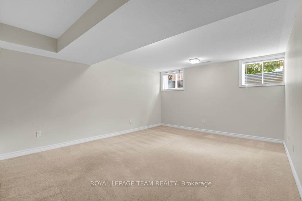 Lower level Family Room with large windows
