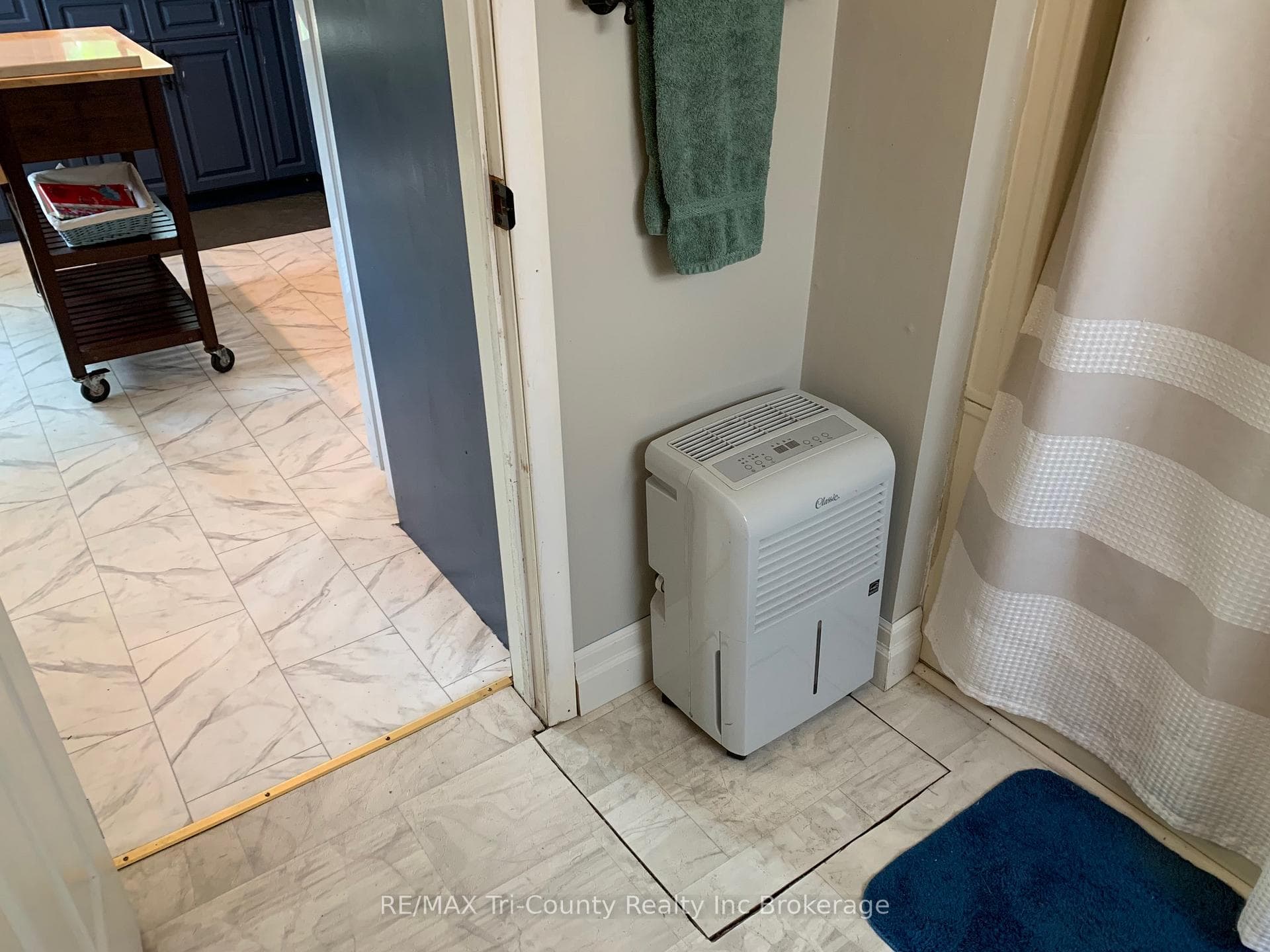 water shut-off value through the floor on bathroom