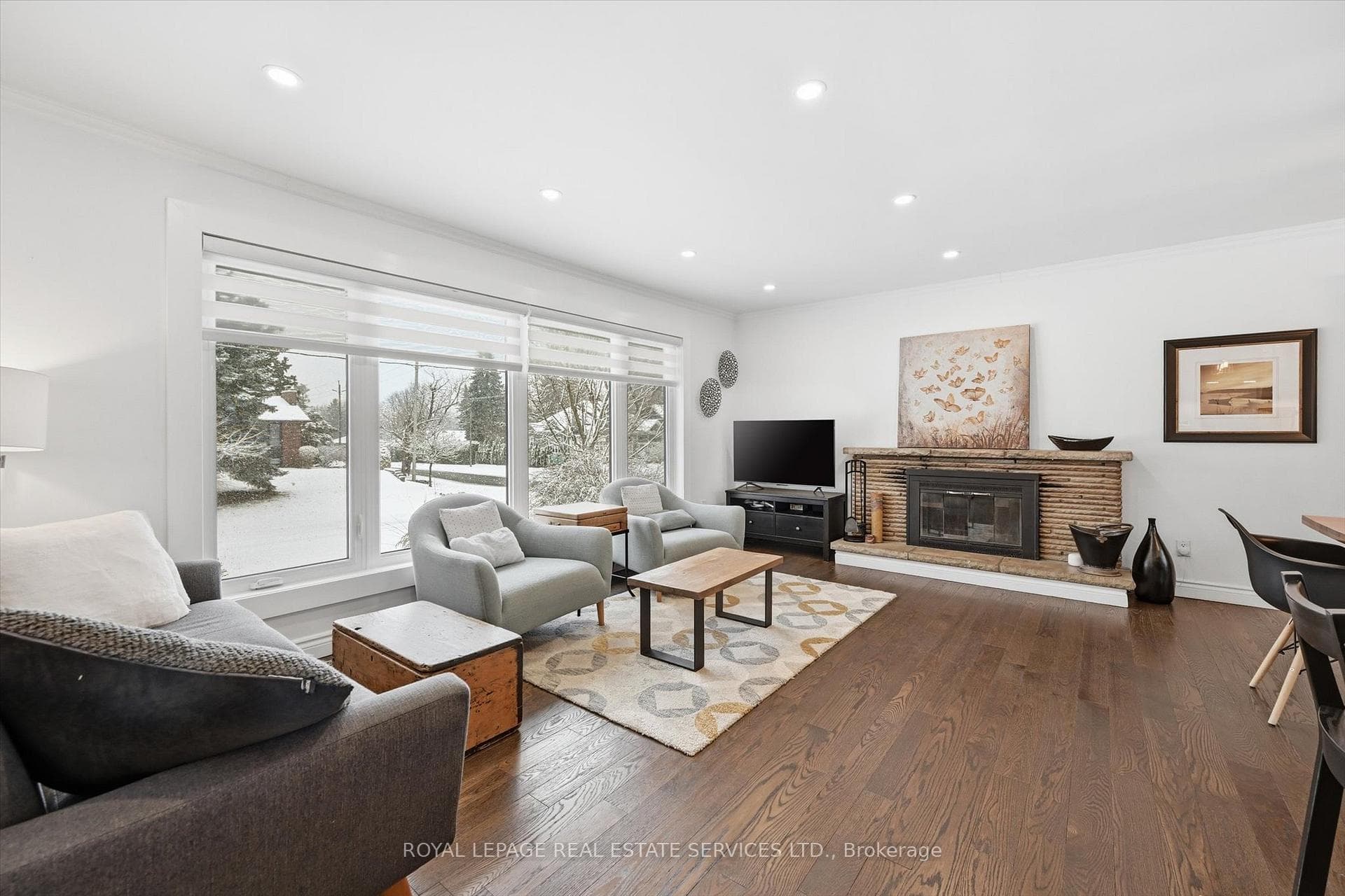 Living Room with Classic Woodburning Fireplace