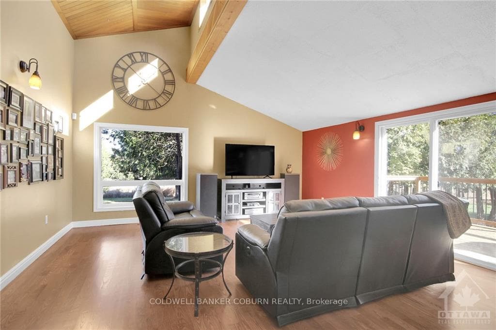 Large family room opens out onto the new deck - pe