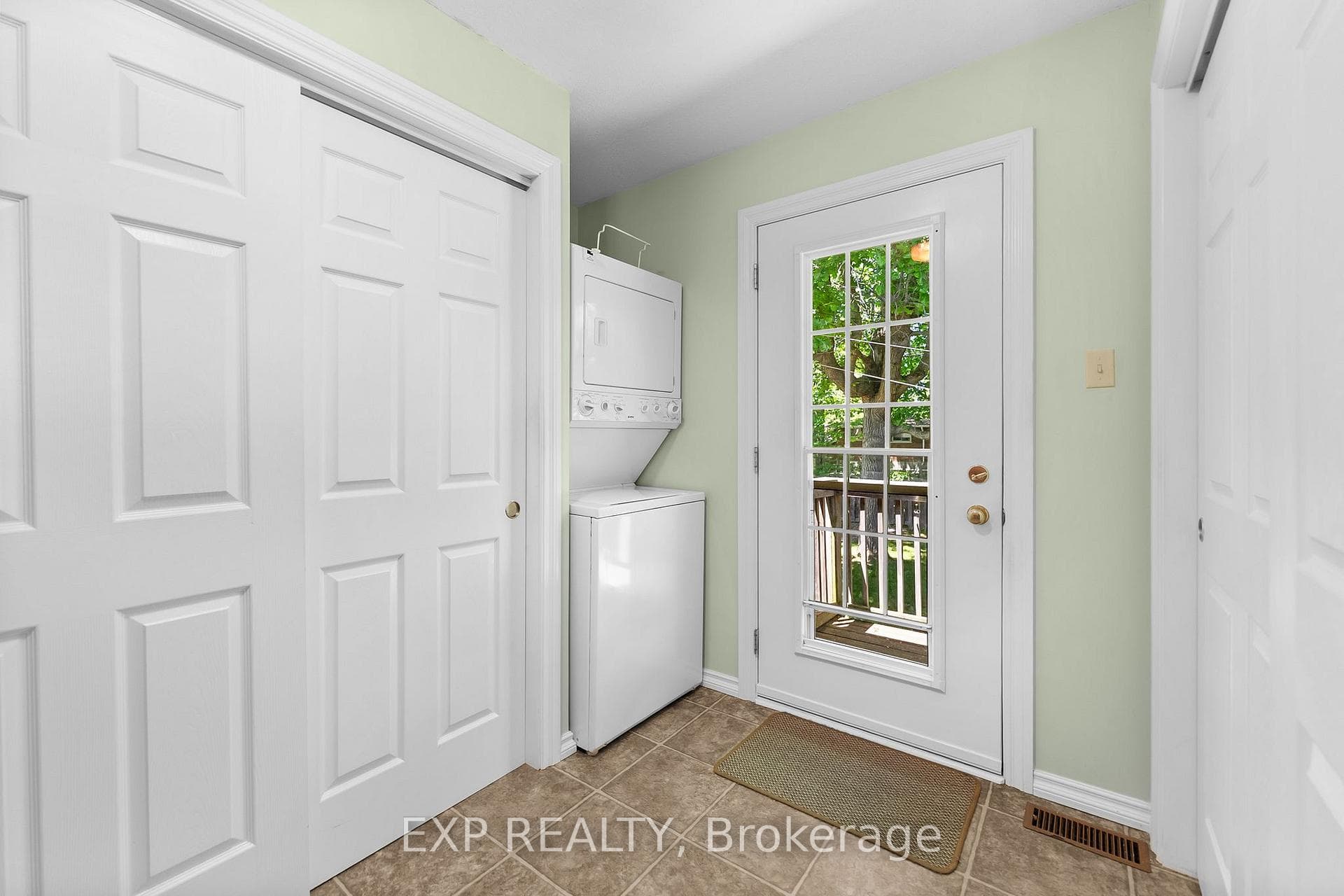 Laundry room, storage, door to rear deck