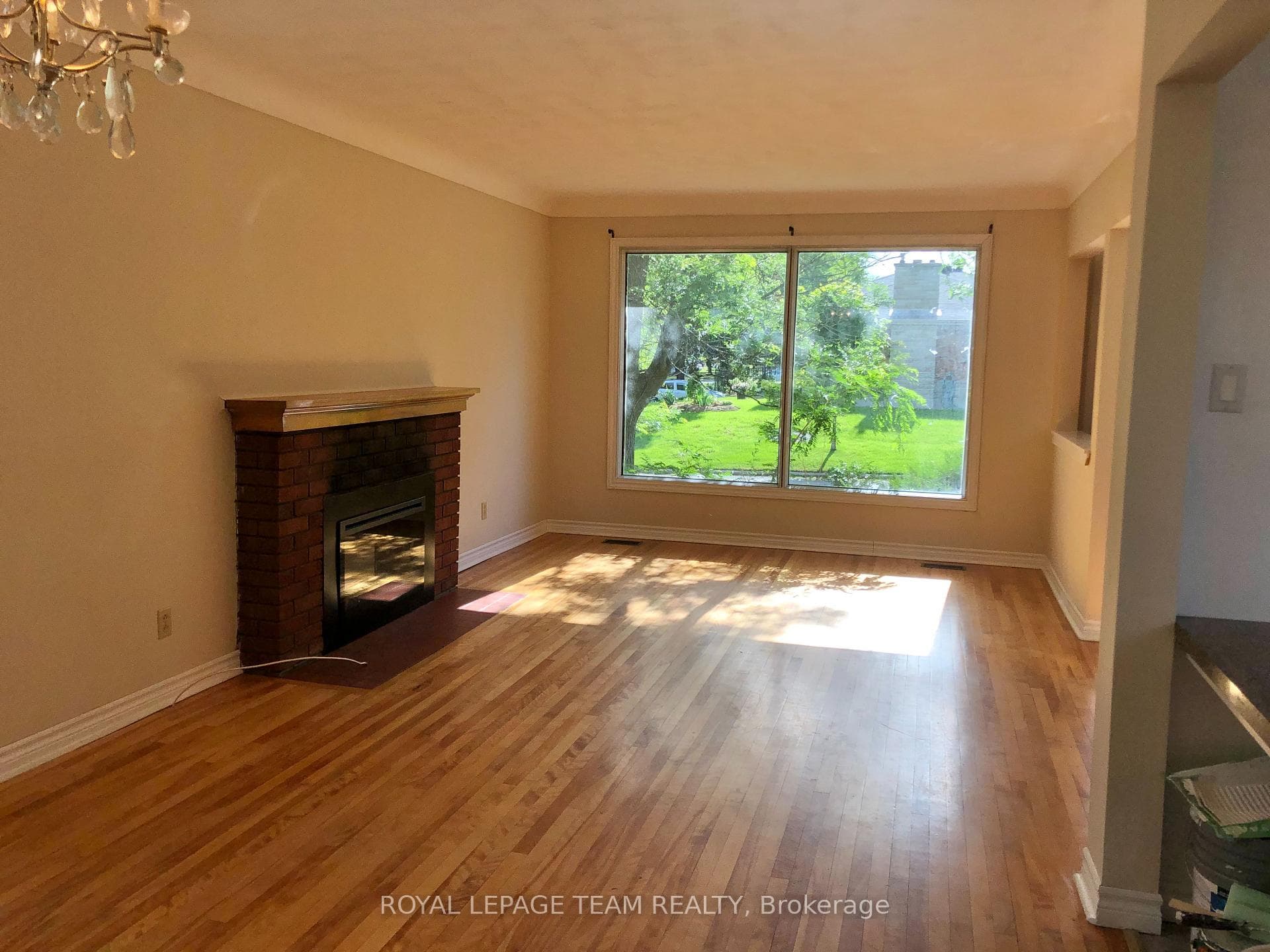Unit 1: Living Room with Electric Fireplace