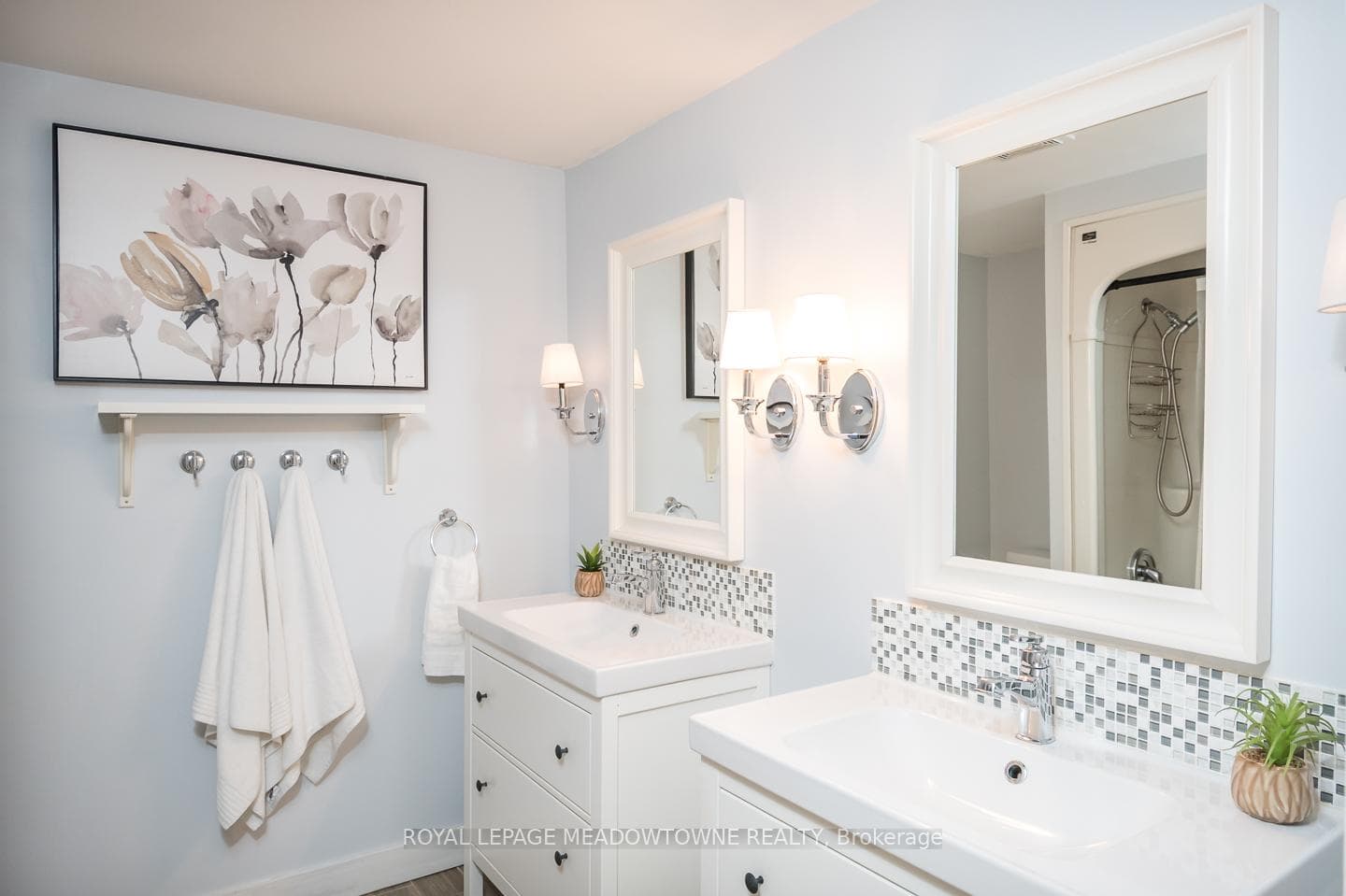 Updated main upper bath with double vanities