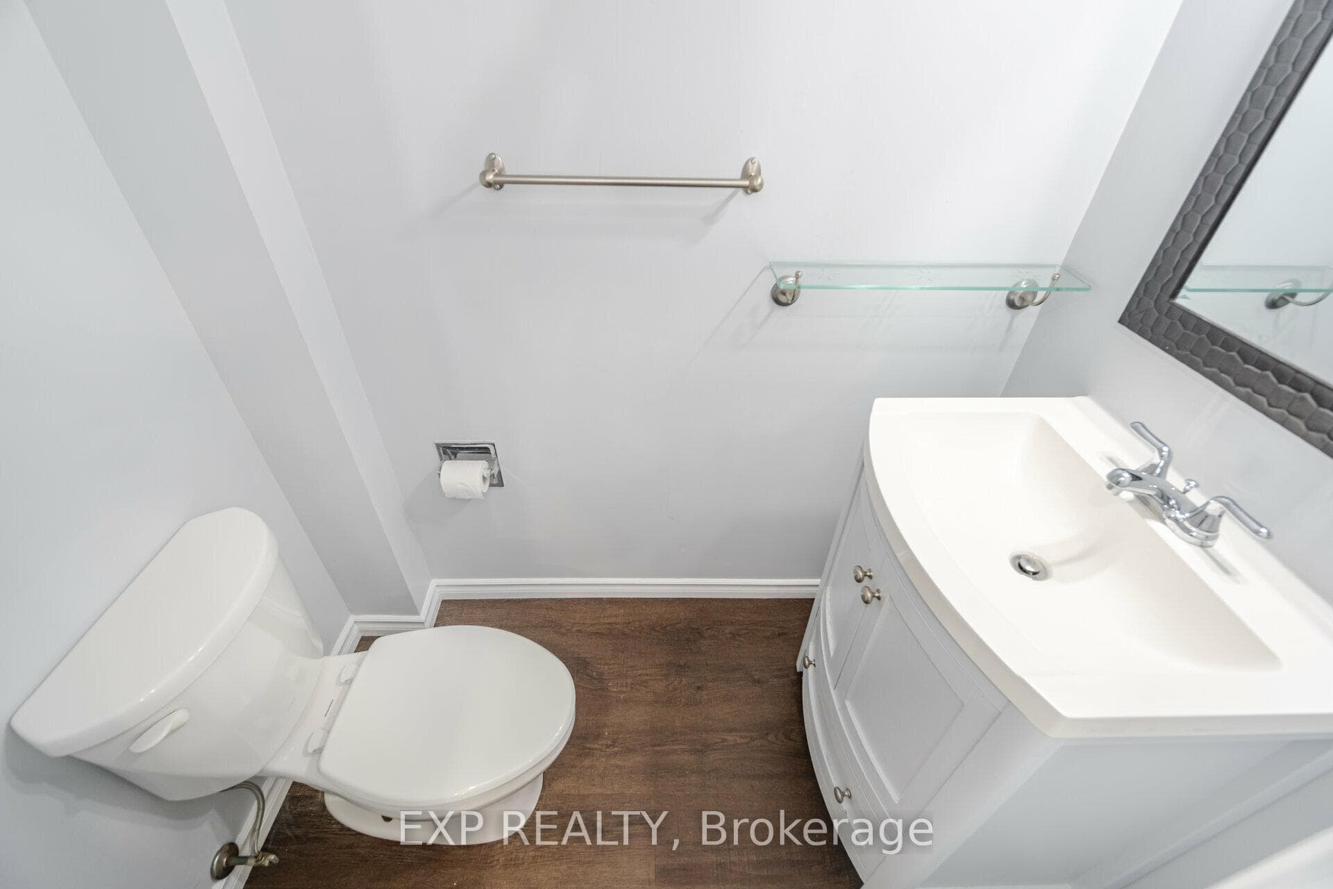 Main floor 2 piece bathroom with cabinet storage!