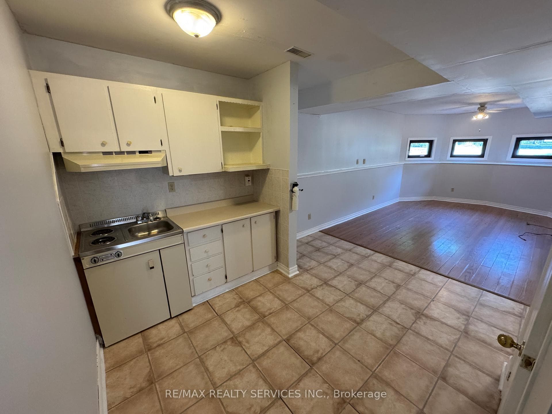 Basement Kitchenette Combined With Living Room