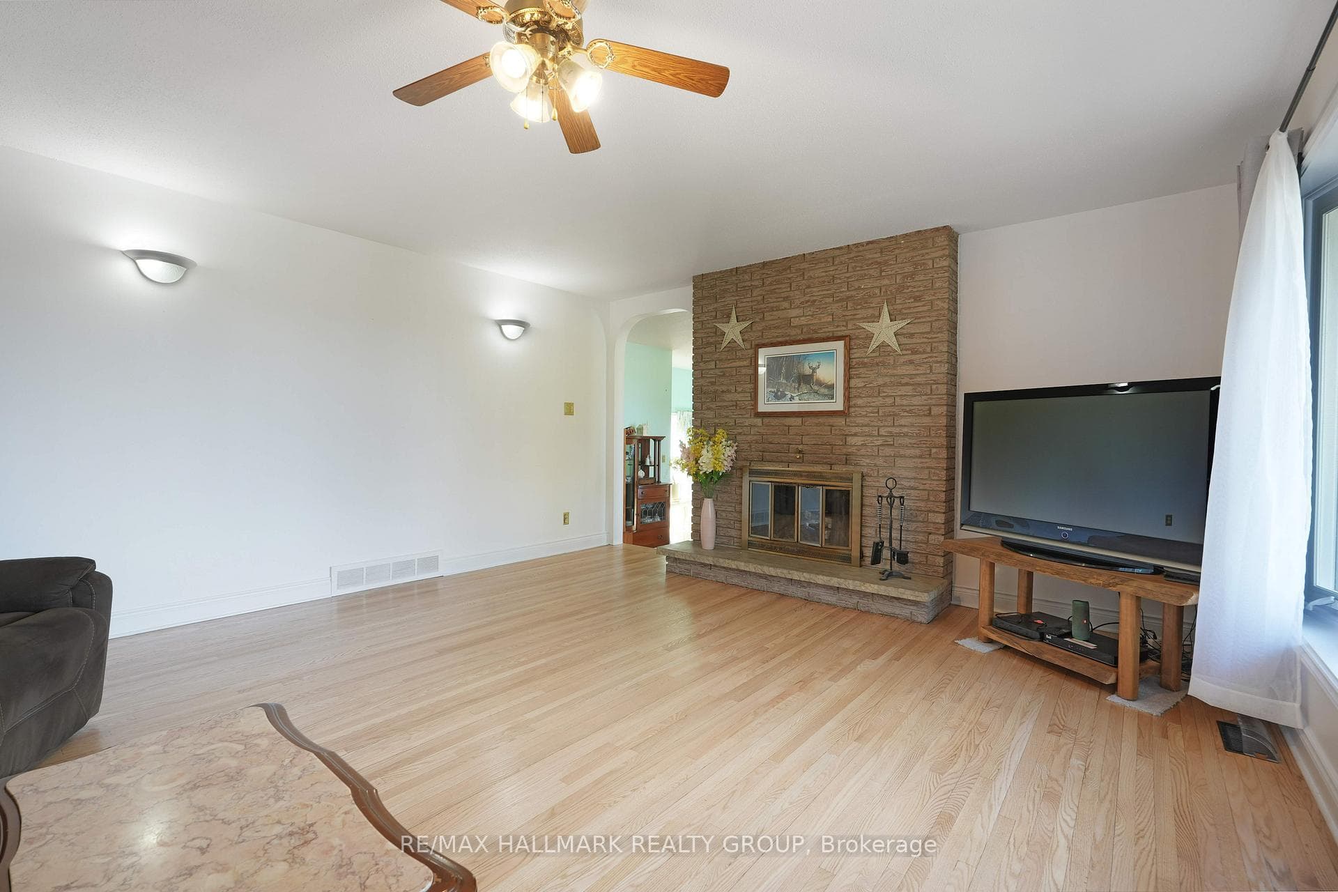 Living Room with Wood-Burning Fireplace