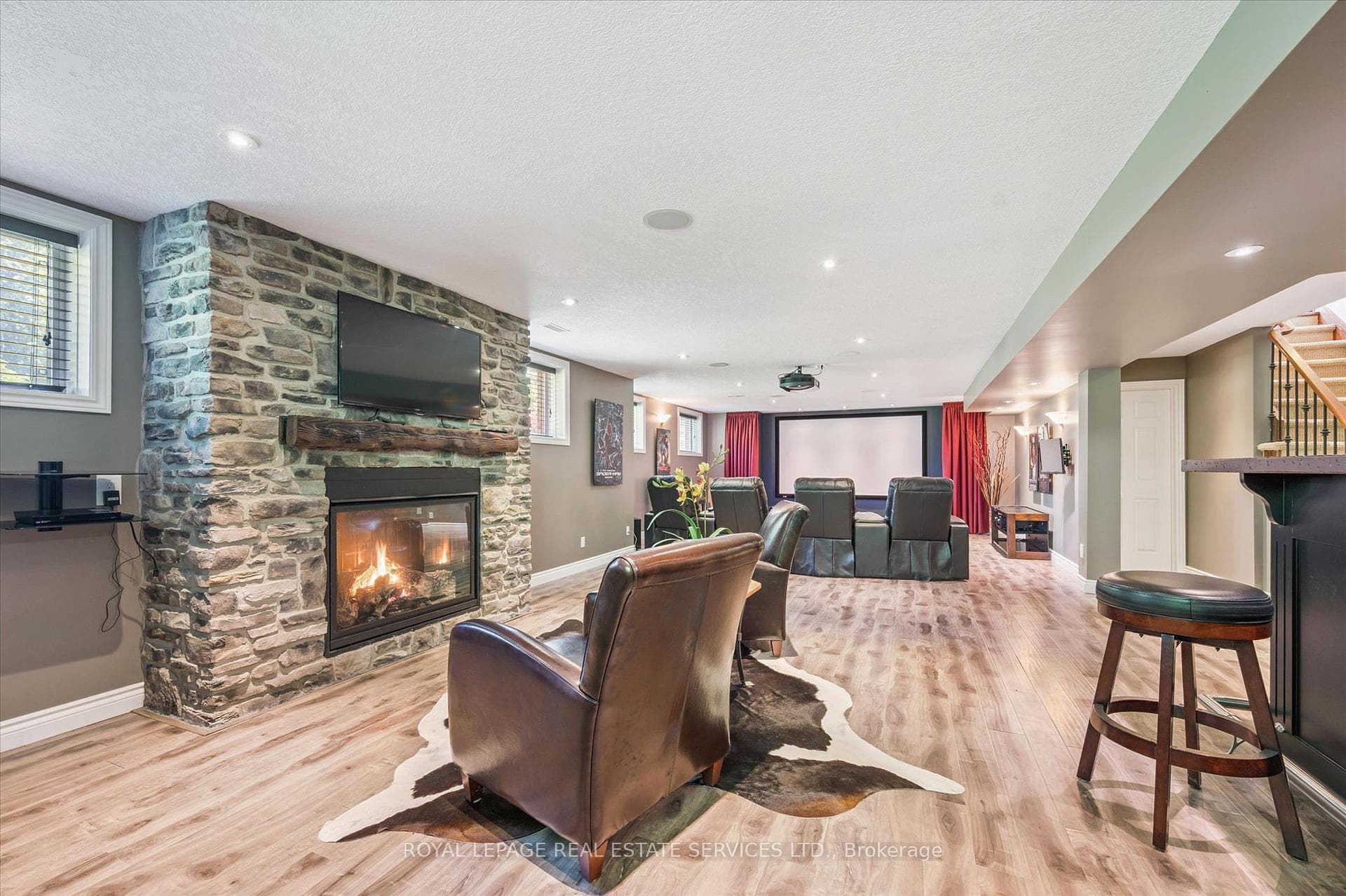 Recreation Room with an Impressive Stone Fireplace