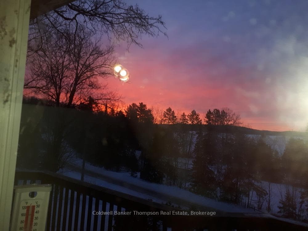 Sunset from window provided by Seller