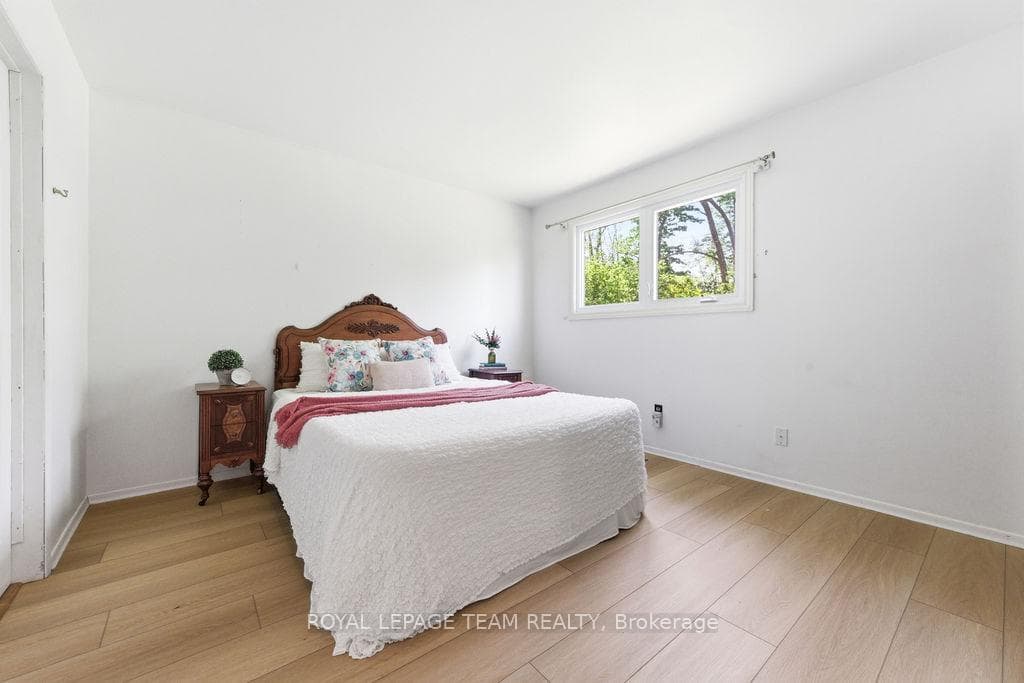 Primary bedroom with cheater bathroom left