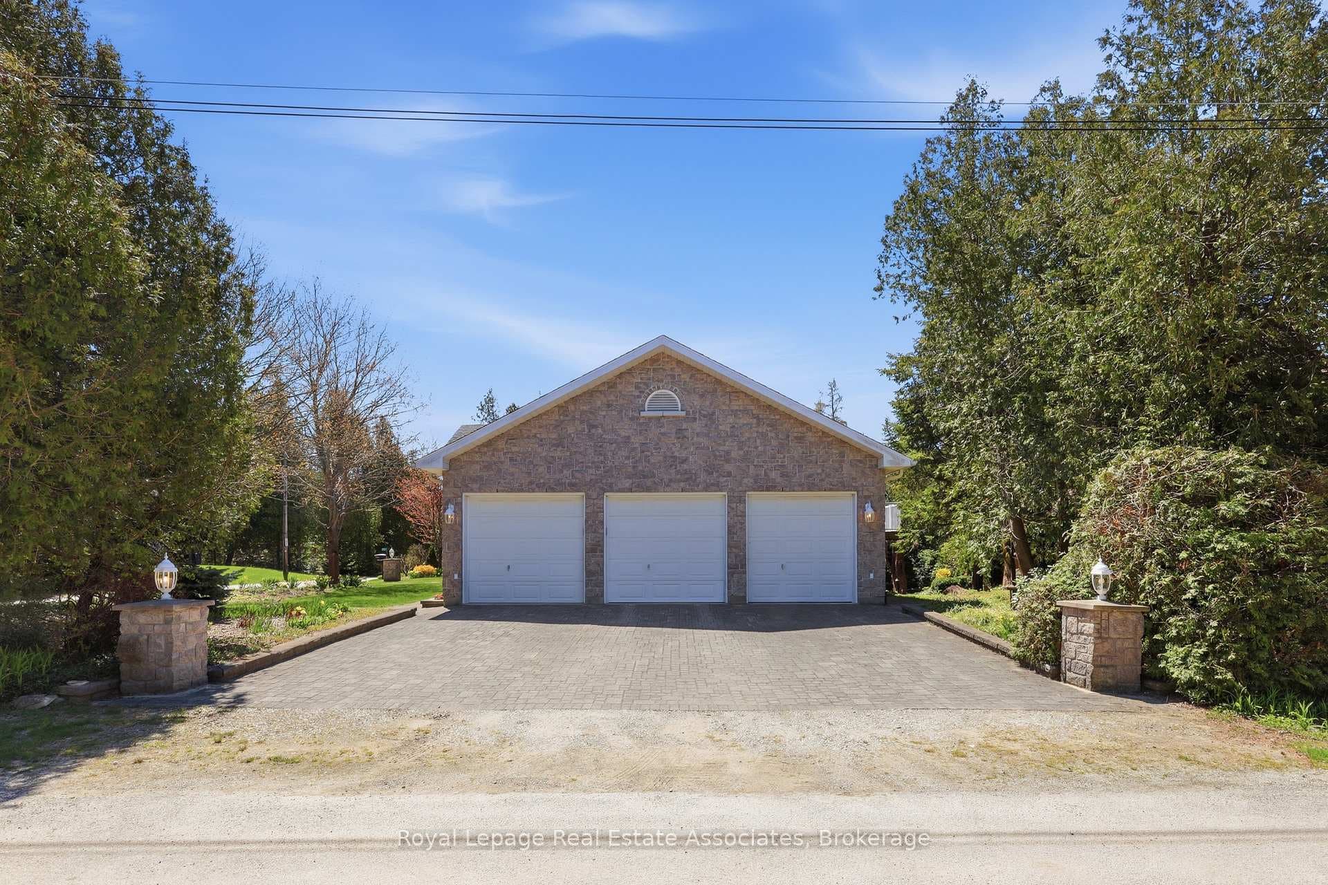 Three-car Garage | Full Stone Exterior