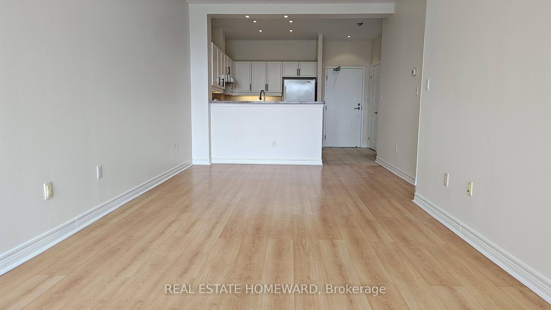 Open Concept to Breakfast Bar and Kitchen