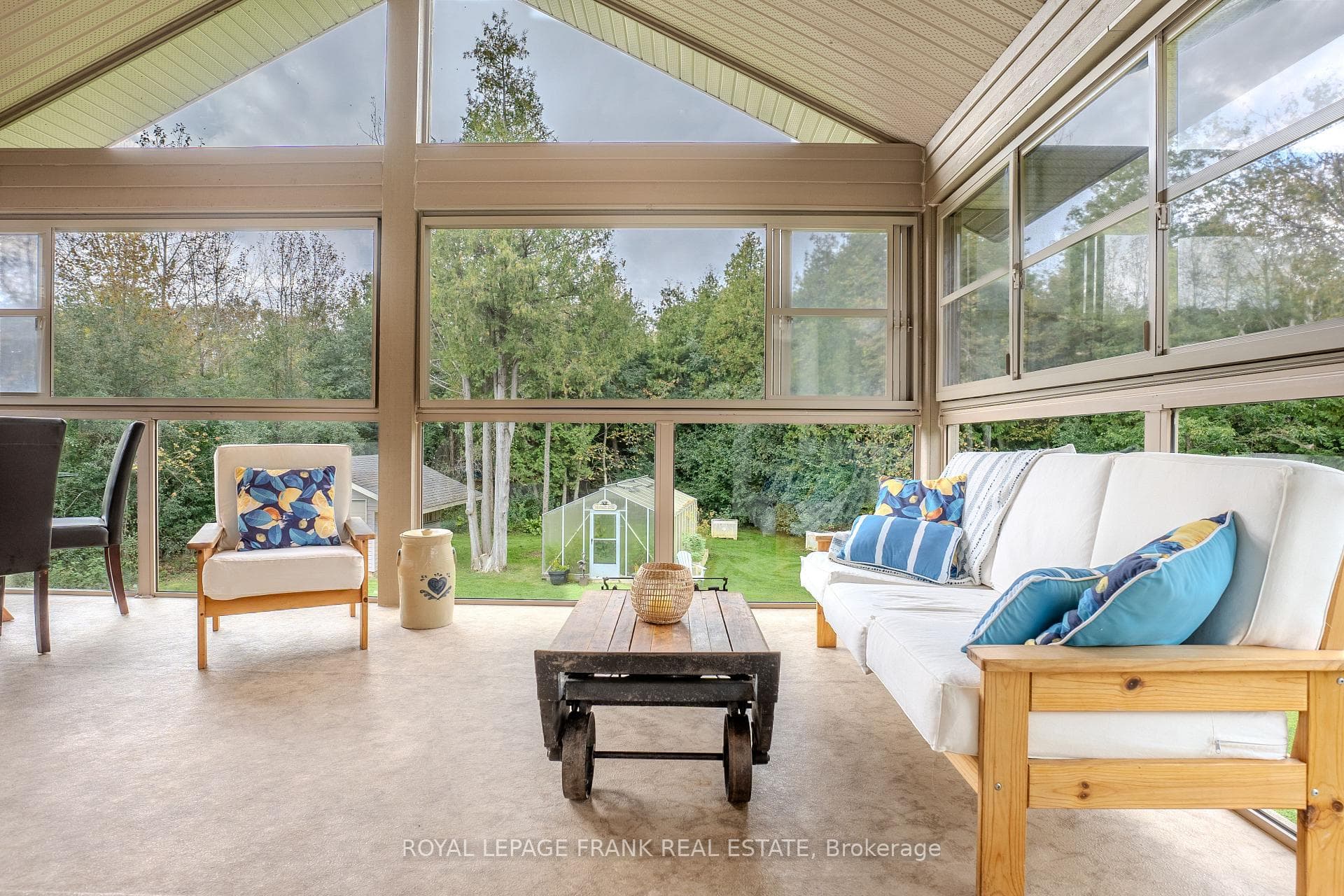 Entrance to upper sunroom overlooking backyard