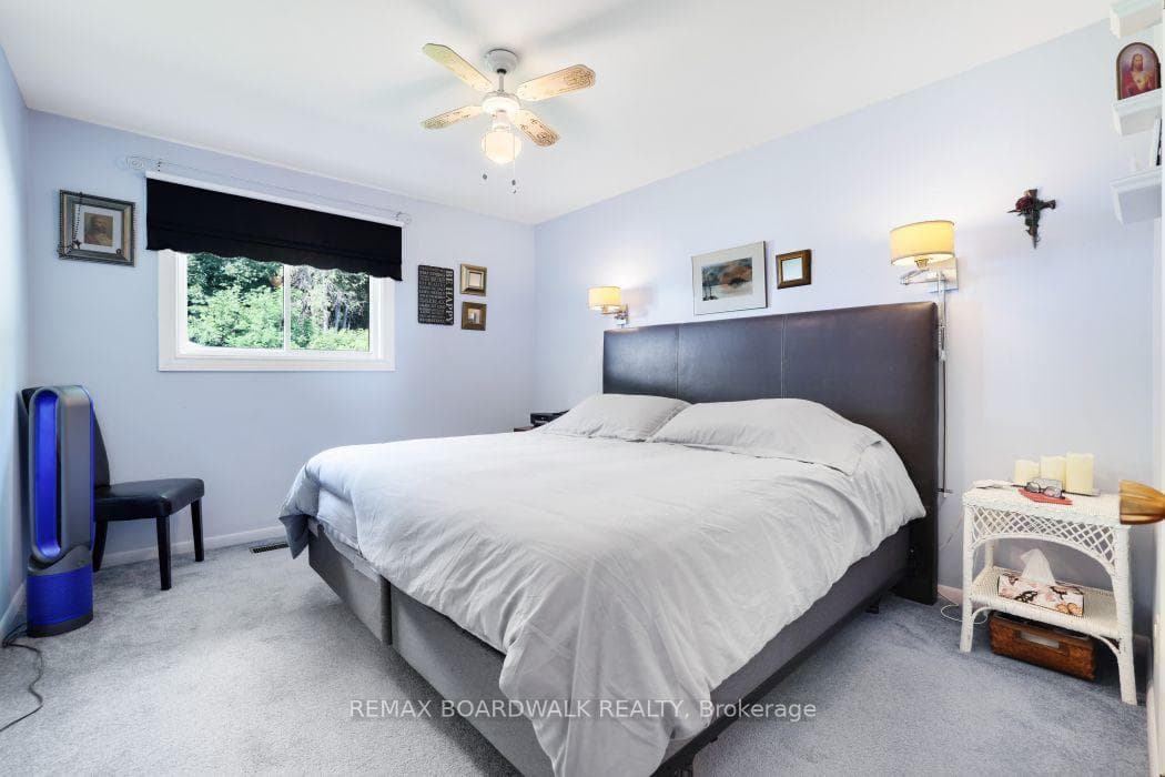 One of three upper bedrooms