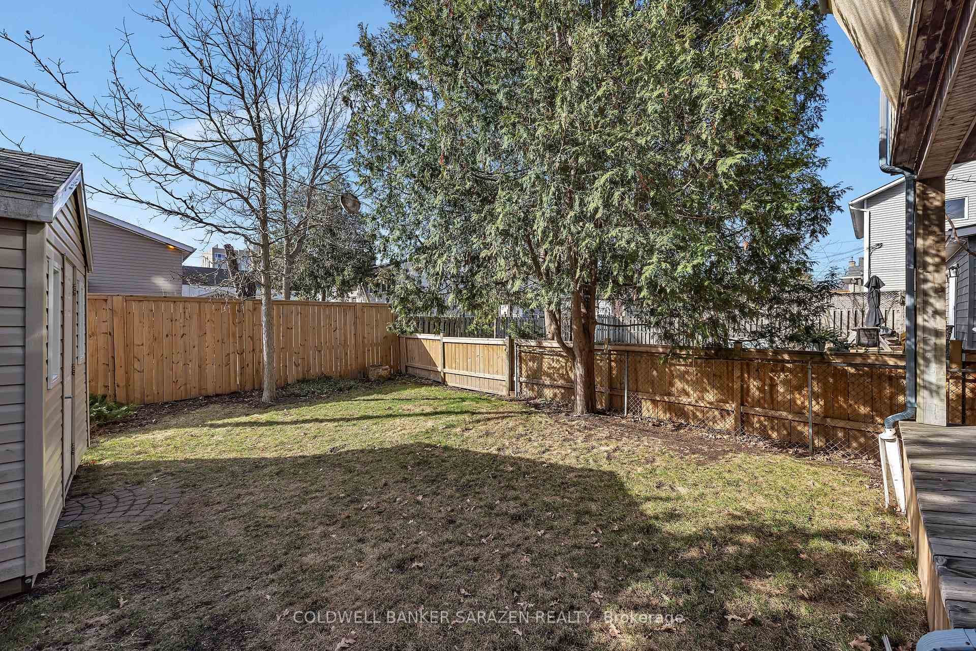 Fenced yard with 10 x10 shed