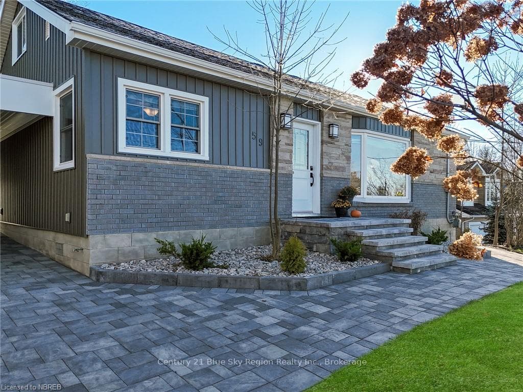 Property entrance with a patio area