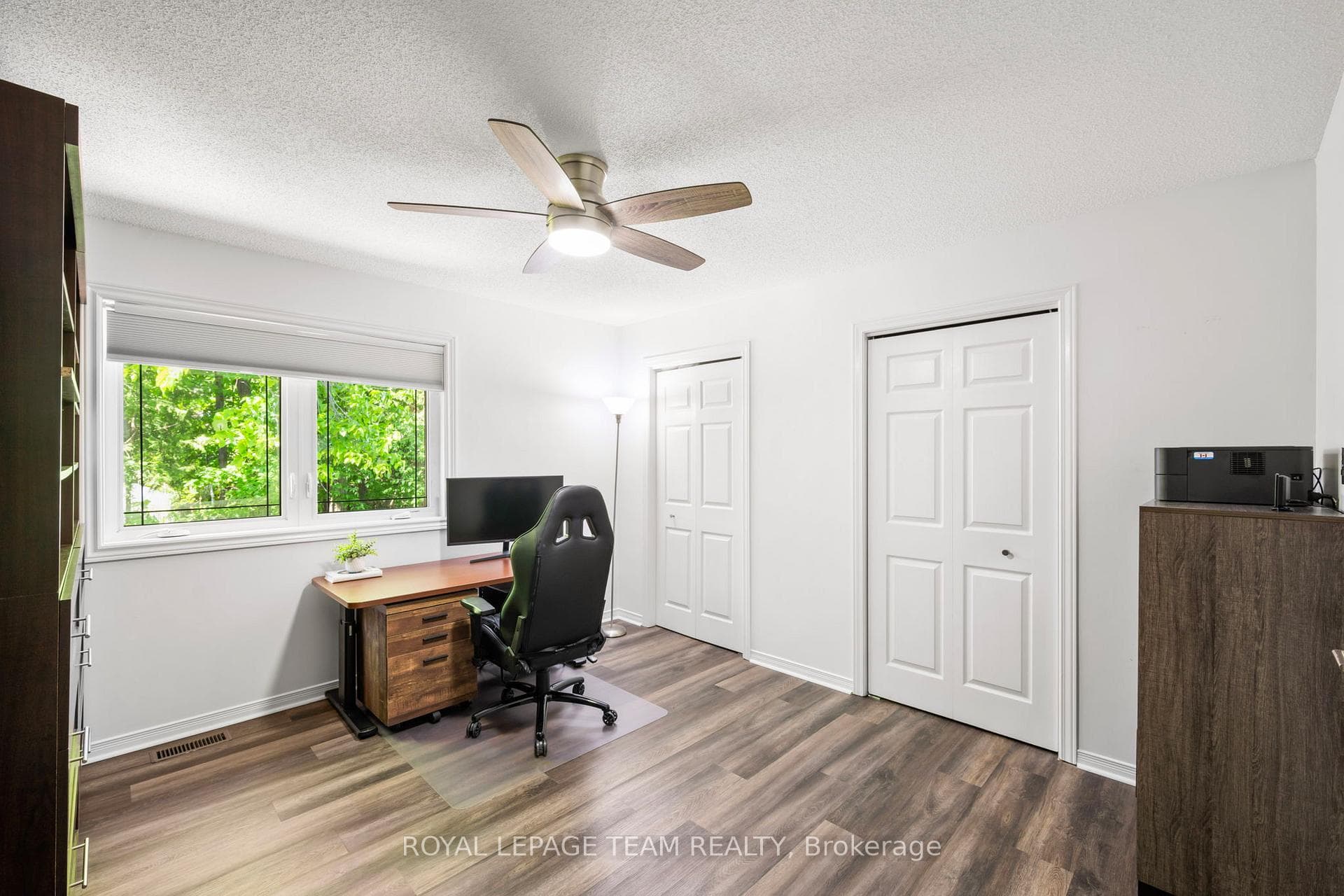 Bedroom 2 with 2 large closets, tree views