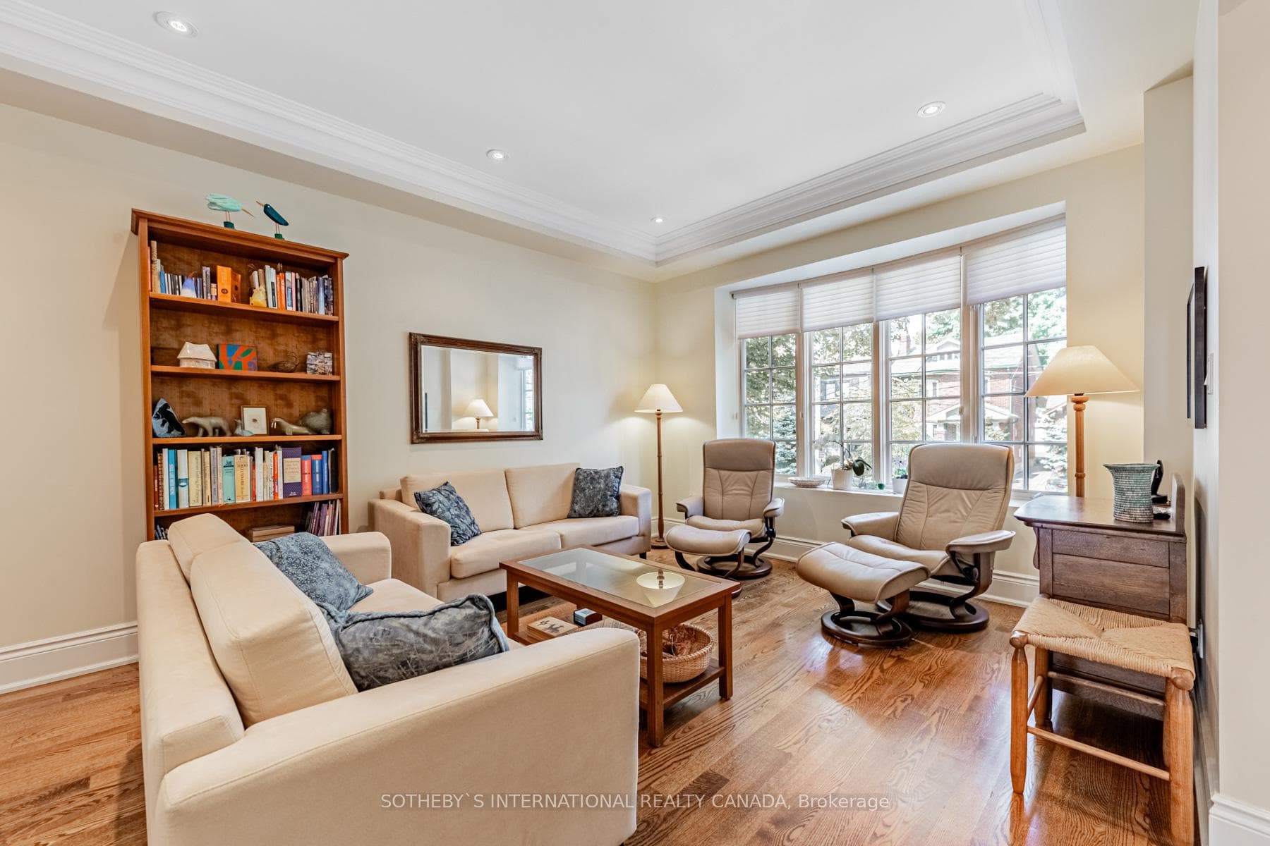 Spacious living room w/ open-concept dining area.