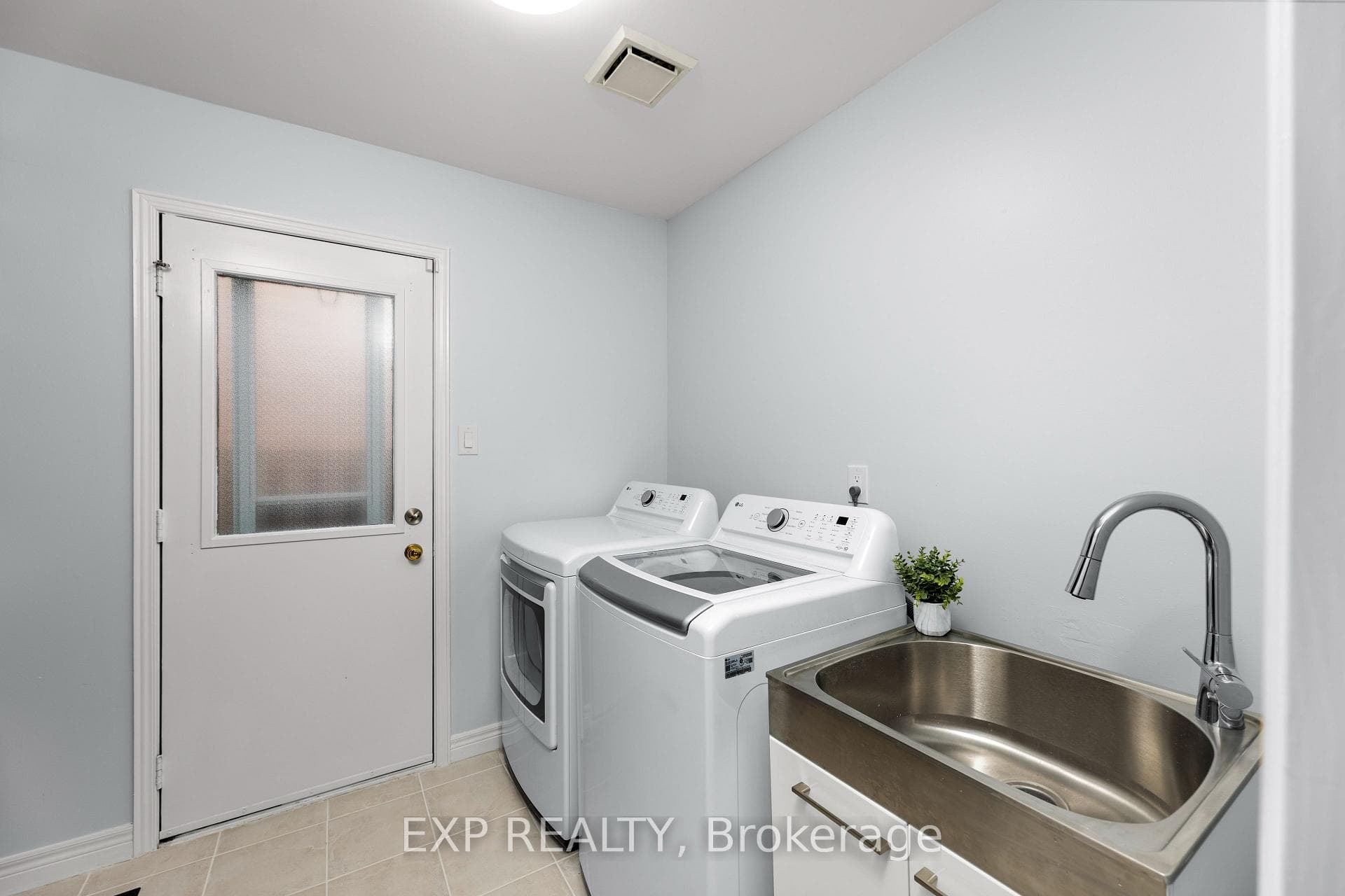 Main Floor Laundry with Side Entrance