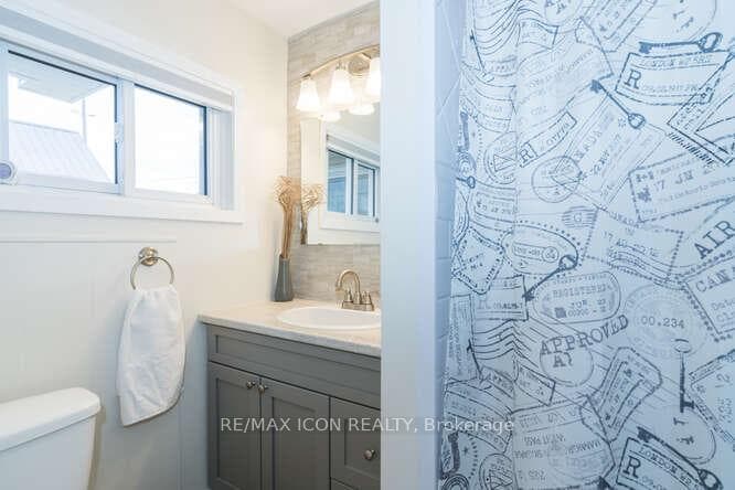 Updated main floor Bath-Bath Fitter & GCW vanity