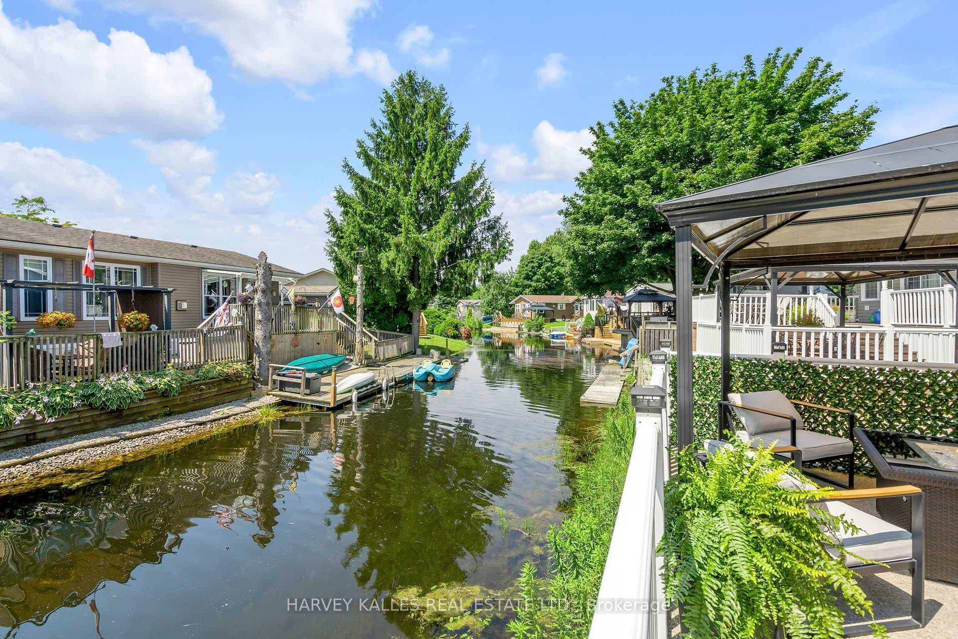 Backyard river views w. a covered area on terrace