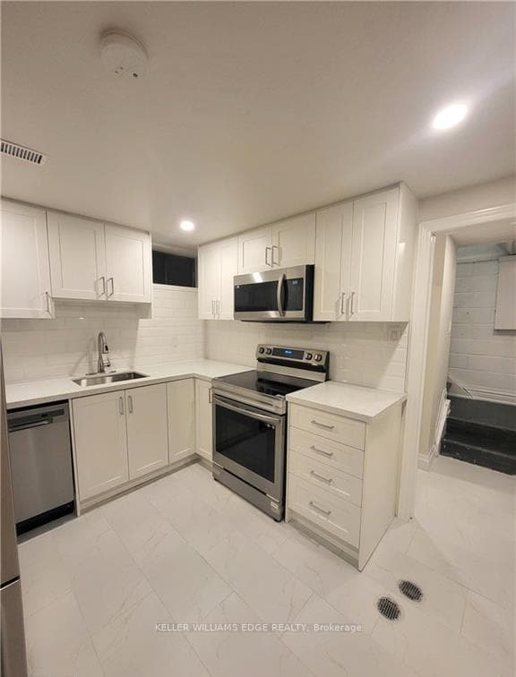 Kitchen w/ Stainless Steel Appliances