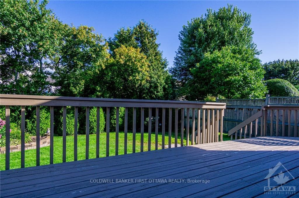 large deck with entry from door in eat in area for