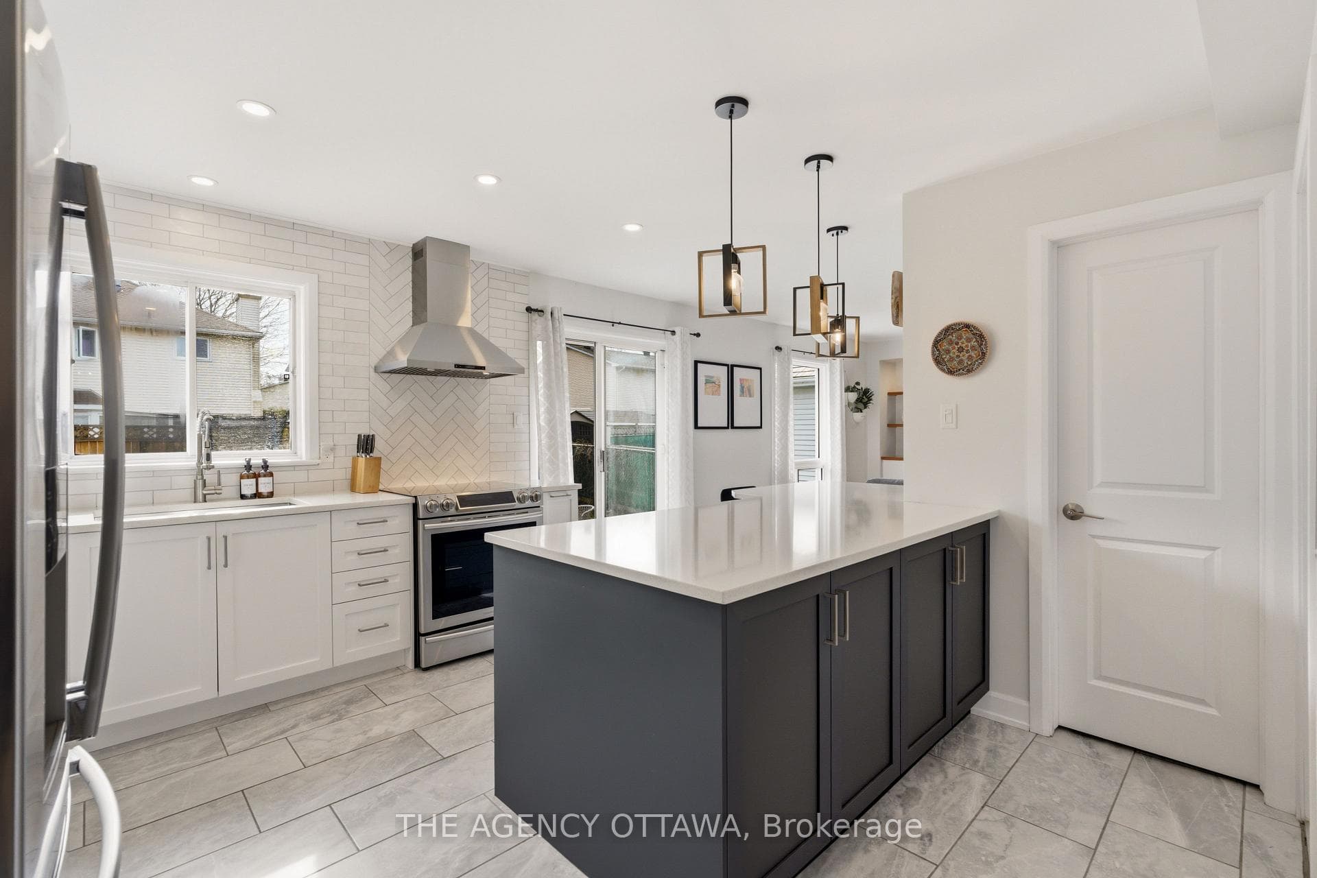 Two-tone cabinets with quartz island