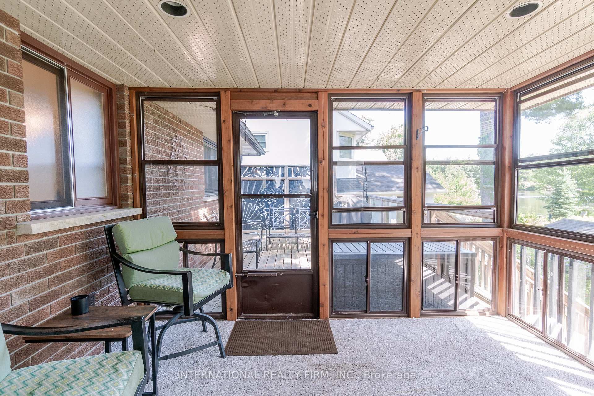 Sun room leads on to the deck.