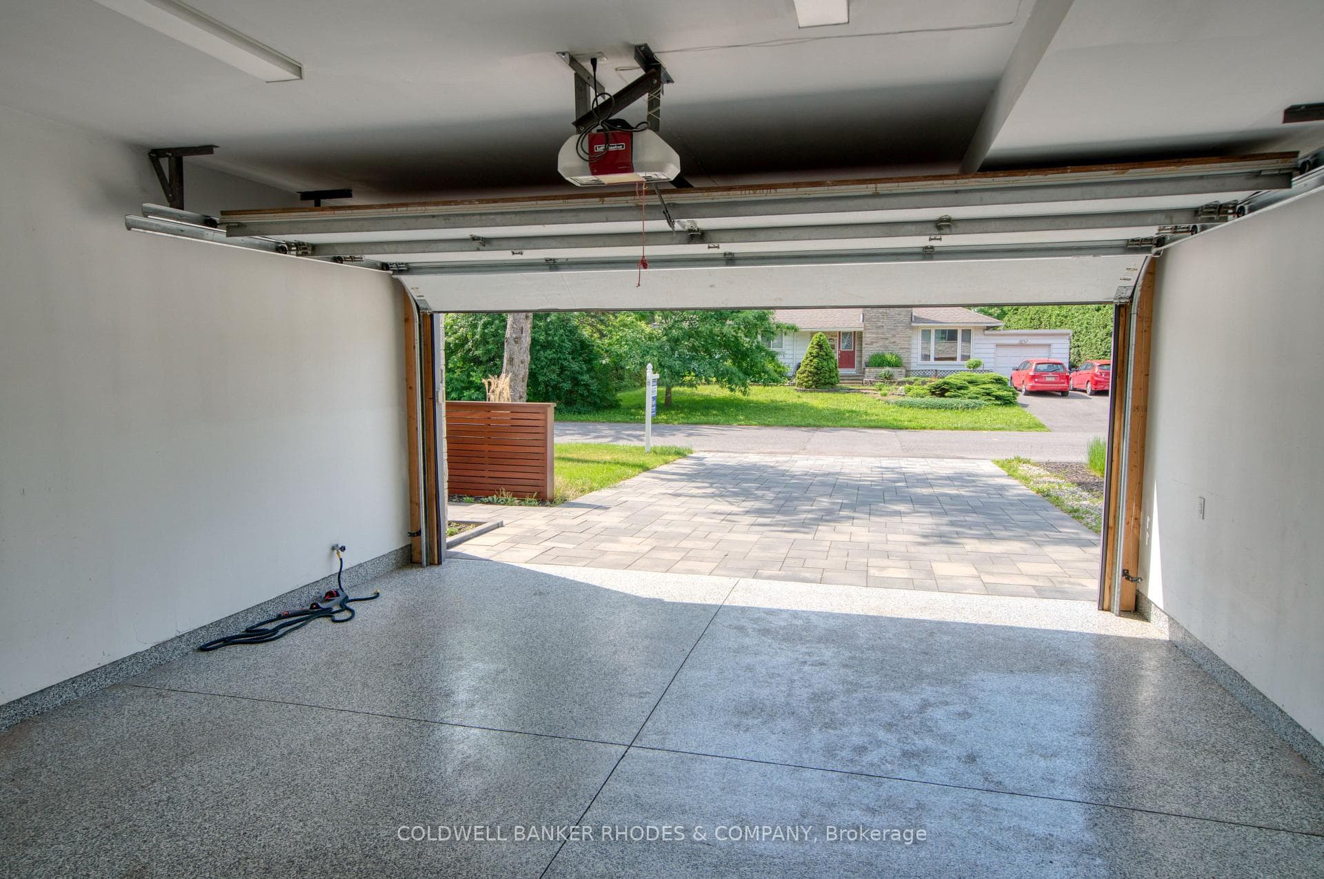 Garage w/epoxy flooring & driveway glycol heated