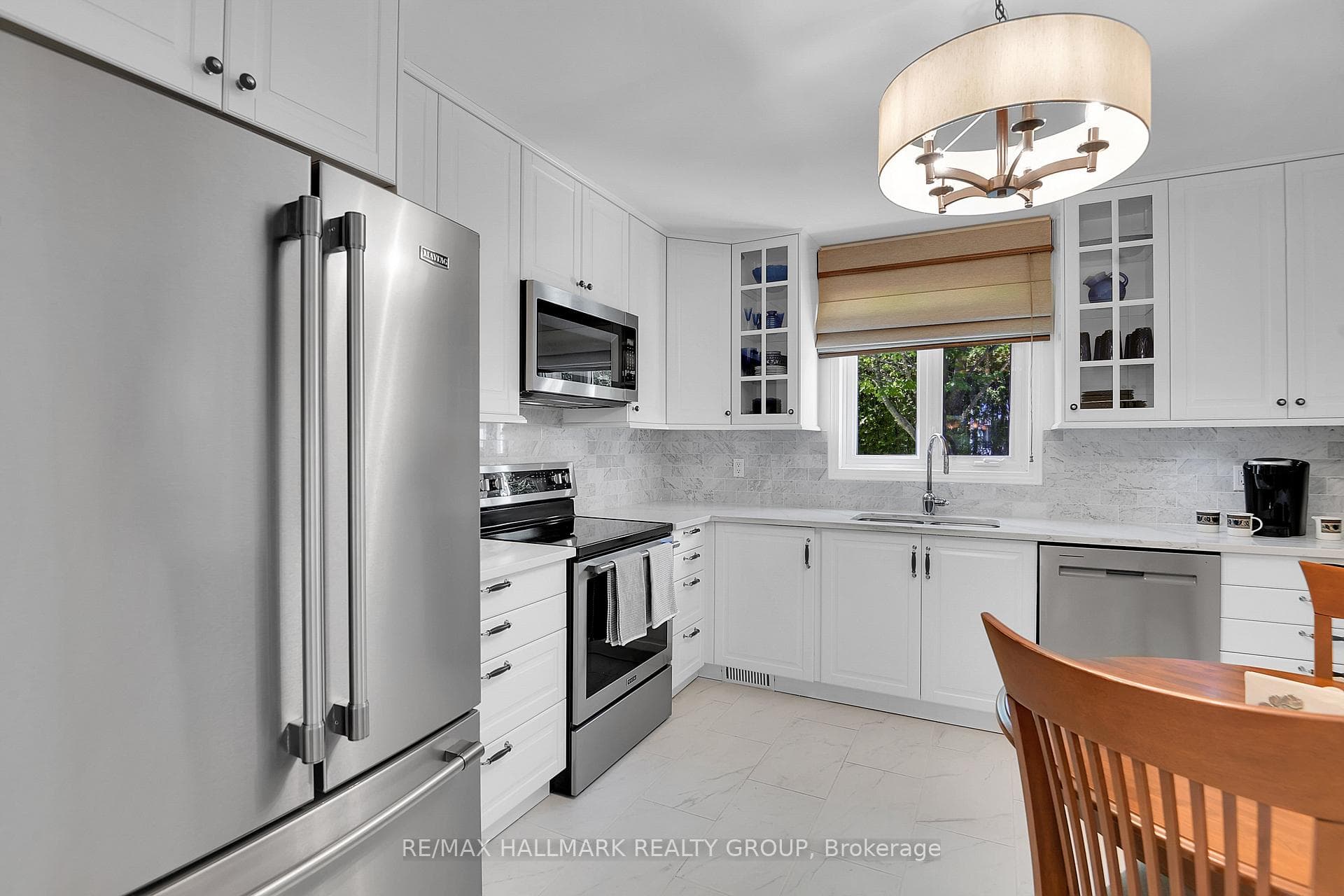 KITCHEN | porcelain tile floor, overlooks backyard