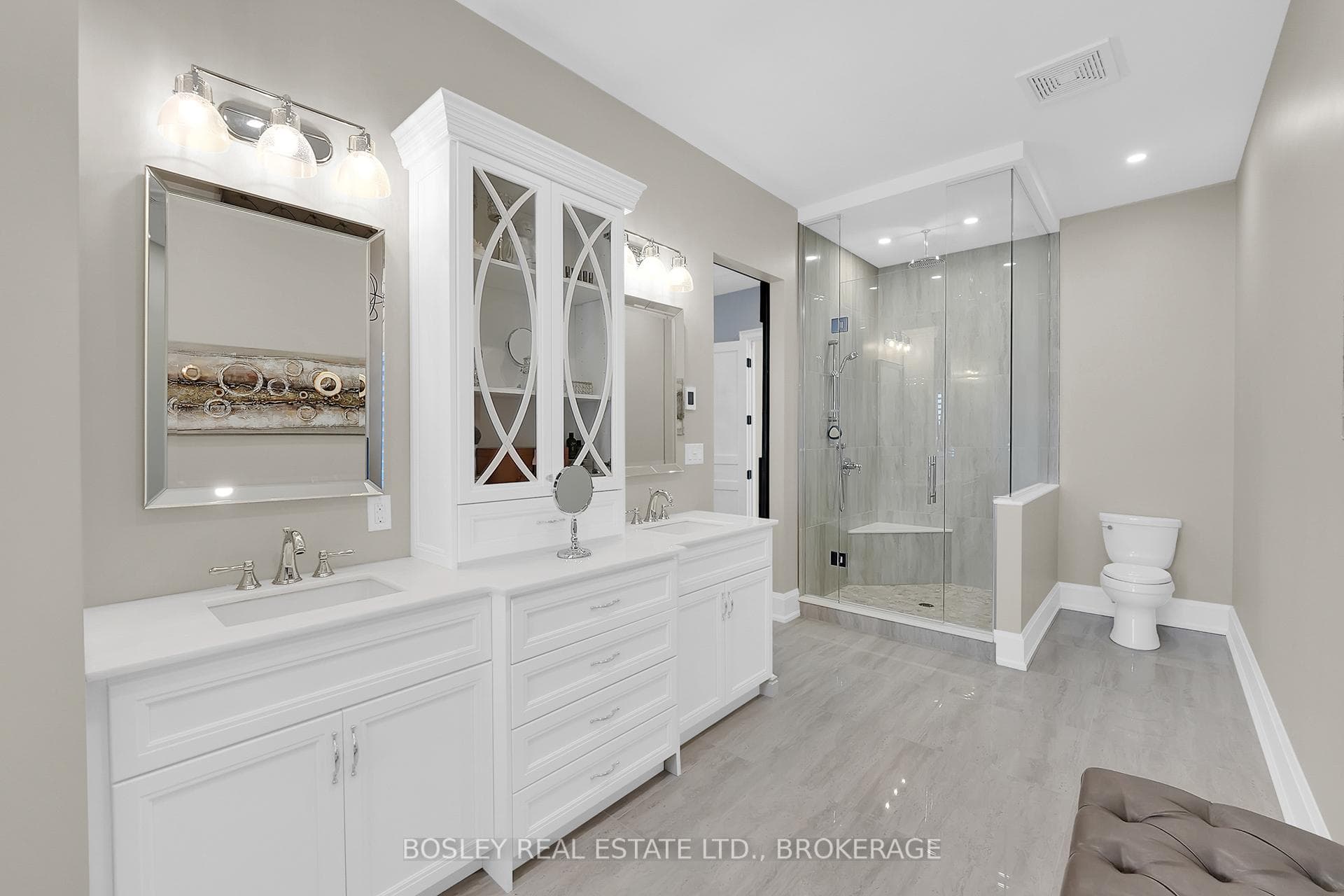 ensuite with custom double-sink vanity, spa shower